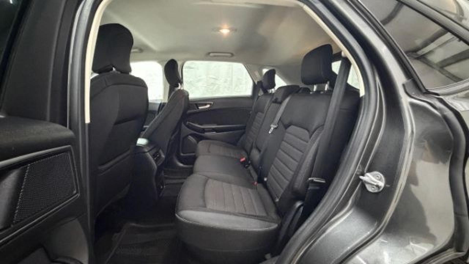 2016 Gray Ford Edge SE (2FMPK4G98GB) with an EcoBoost 2L I-4 gasoline direct injection engine, located at 1806 Veterans Memorial Hwy SW, Austell, GA, 30168, (770) 944-9558, 33.817959, -84.606987 - Photo#16