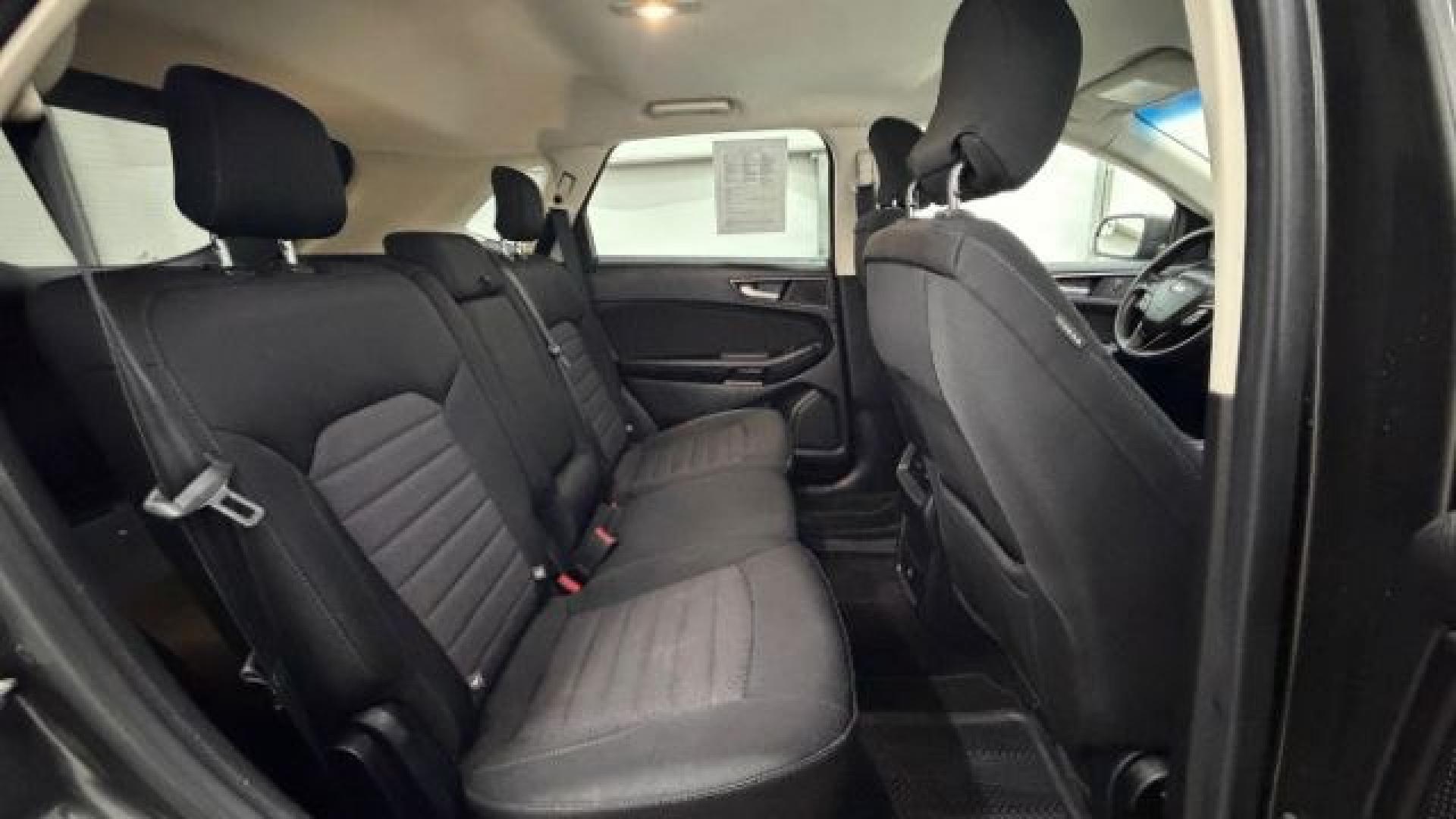 2016 Gray Ford Edge SE (2FMPK4G98GB) with an EcoBoost 2L I-4 gasoline direct injection engine, located at 1806 Veterans Memorial Hwy SW, Austell, GA, 30168, (770) 944-9558, 33.817959, -84.606987 - Photo#17