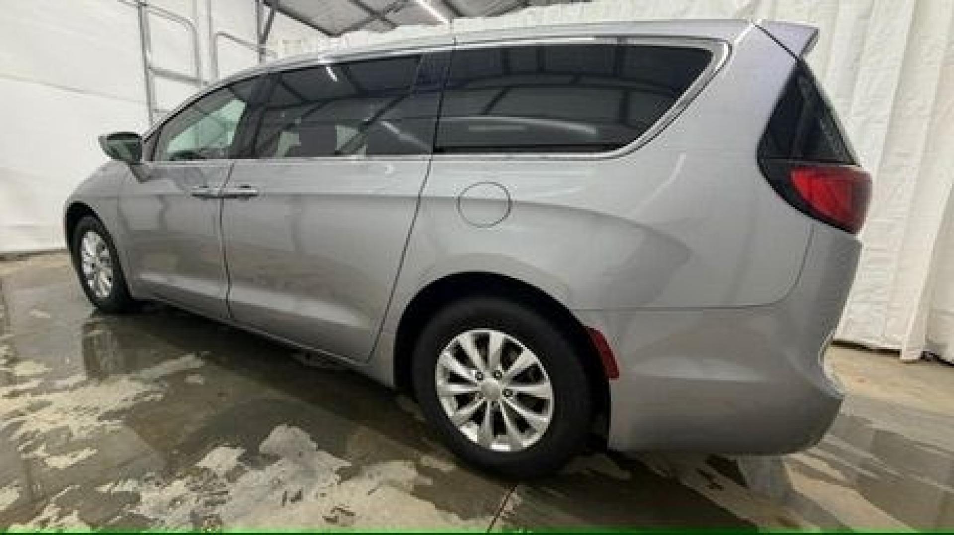 2018 Silver Chrysler Pacifica Touring Plus (2C4RC1FG8JR) with an 3.6L V-6 DOHC engine, located at 1806 Veterans Memorial Hwy SW, Austell, GA, 30168, (770) 944-9558, 33.817959, -84.606987 - Photo#2