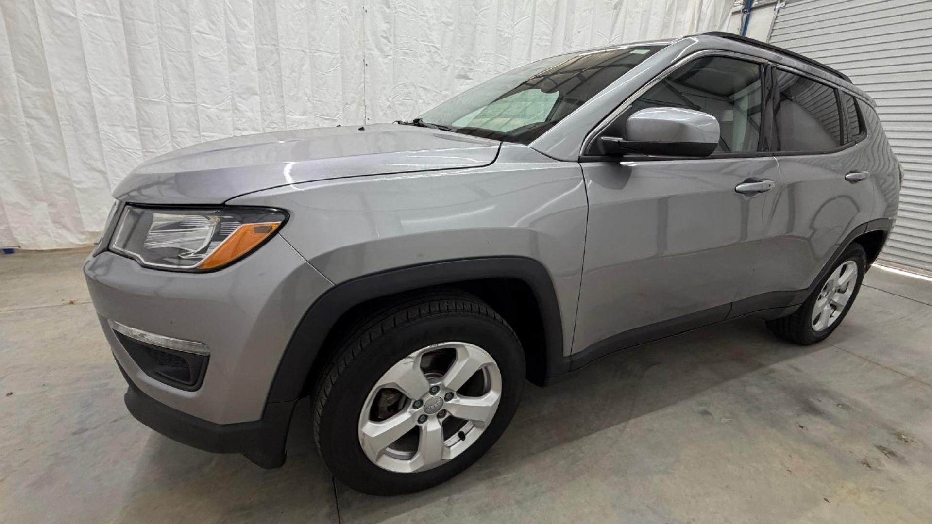2019 Silver Jeep Compass Latitude FWD (3C4NJCBB2KT) with an 2.4L I-4 variable valve control engine, located at 1806 Veterans Memorial Hwy SW, Austell, GA, 30168, (770) 944-9558, 33.817959, -84.606987 - Photo#1