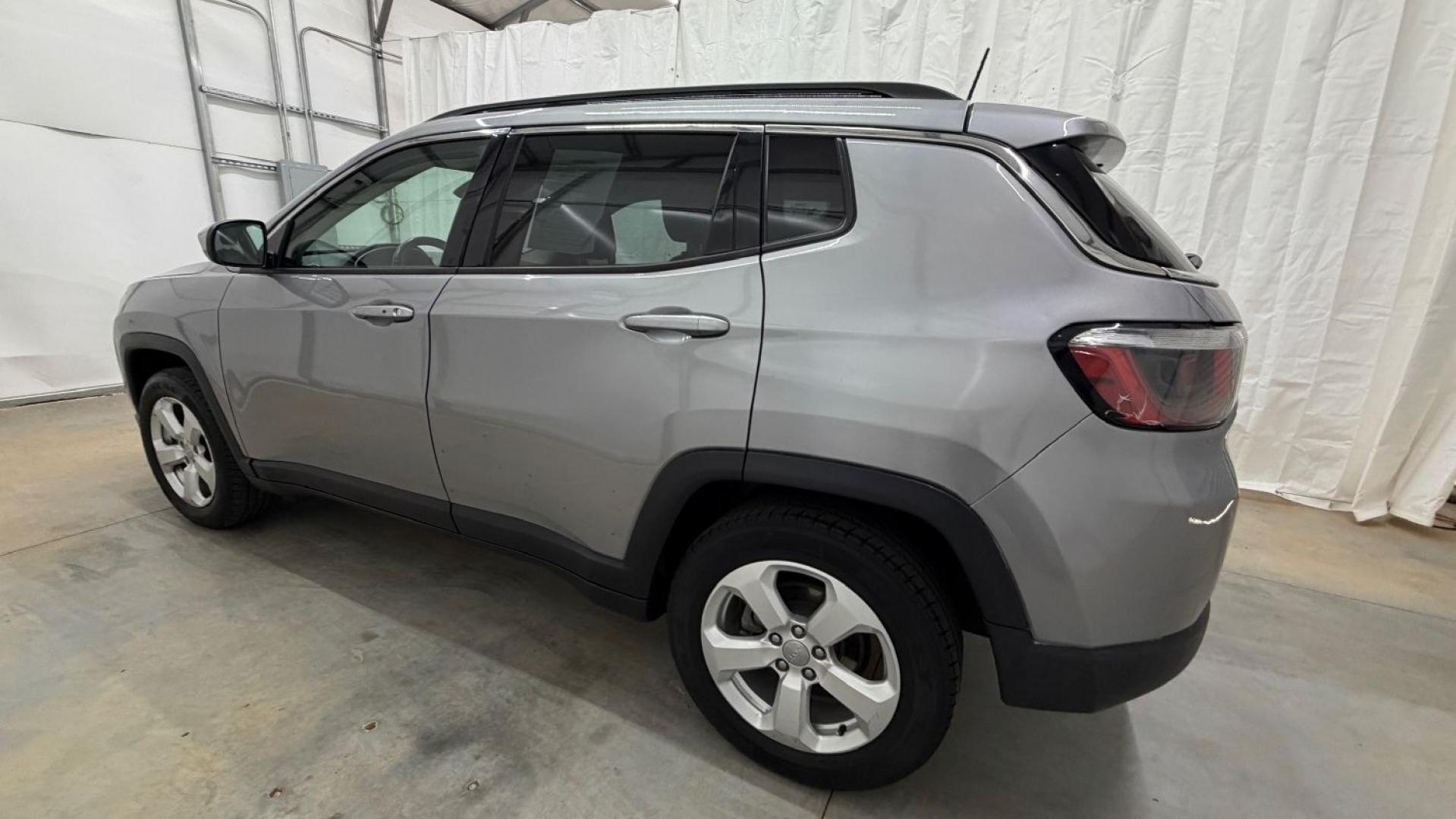 2019 Silver Jeep Compass Latitude FWD (3C4NJCBB2KT) with an 2.4L I-4 variable valve control engine, located at 1806 Veterans Memorial Hwy SW, Austell, GA, 30168, (770) 944-9558, 33.817959, -84.606987 - Photo#2