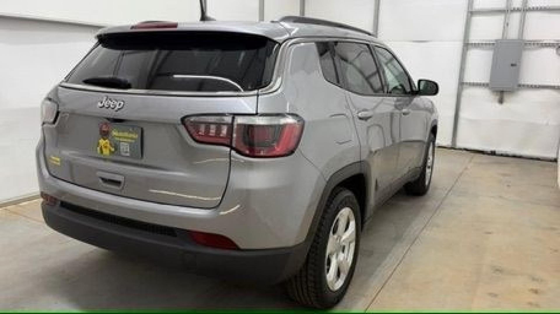 2019 Silver Jeep Compass Latitude FWD (3C4NJCBB2KT) with an 2.4L I-4 variable valve control engine, located at 1806 Veterans Memorial Hwy SW, Austell, GA, 30168, (770) 944-9558, 33.817959, -84.606987 - Photo#5