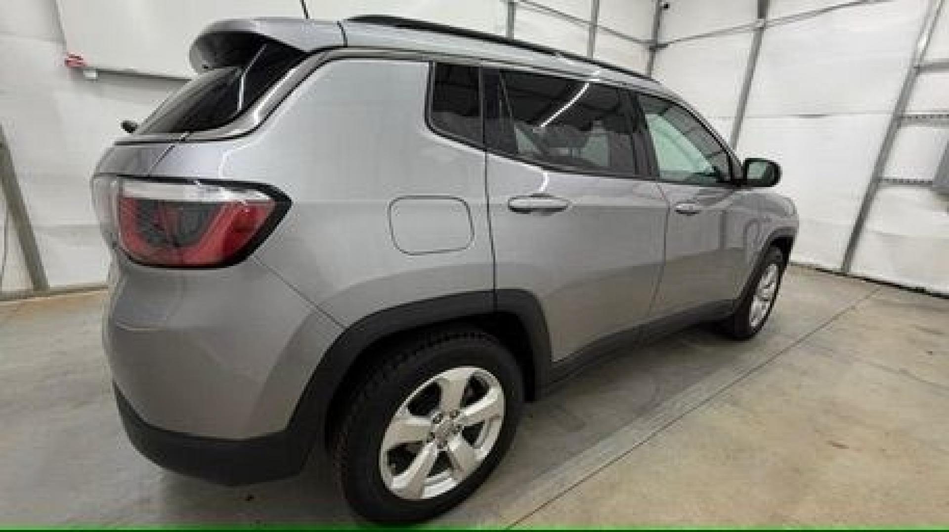 2019 Silver Jeep Compass Latitude FWD (3C4NJCBB2KT) with an 2.4L I-4 variable valve control engine, located at 1806 Veterans Memorial Hwy SW, Austell, GA, 30168, (770) 944-9558, 33.817959, -84.606987 - Photo#6