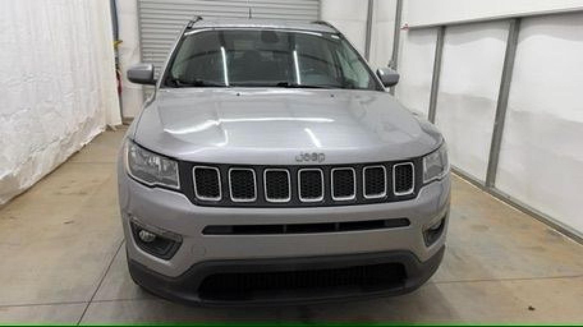 2019 Silver Jeep Compass Latitude FWD (3C4NJCBB2KT) with an 2.4L I-4 variable valve control engine, located at 1806 Veterans Memorial Hwy SW, Austell, GA, 30168, (770) 944-9558, 33.817959, -84.606987 - Photo#9