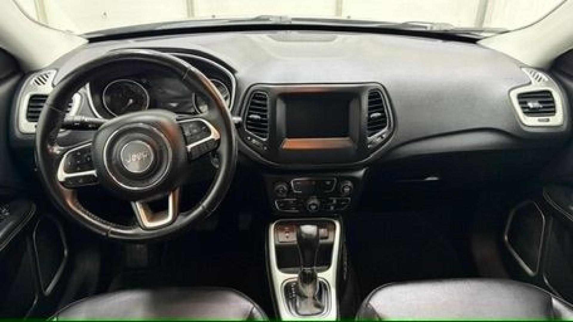 2019 Silver Jeep Compass Latitude FWD (3C4NJCBB2KT) with an 2.4L I-4 variable valve control engine, located at 1806 Veterans Memorial Hwy SW, Austell, GA, 30168, (770) 944-9558, 33.817959, -84.606987 - Photo#16