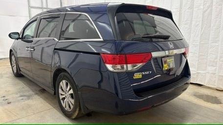 2016 Blue Honda Odyssey EX-L (5FNRL5H66GB) with an 3.5L V-6 i-VTEC variable valve control engine, located at 1806 Veterans Memorial Hwy SW, Austell, GA, 30168, (770) 944-9558, 33.817959, -84.606987 - Photo#3