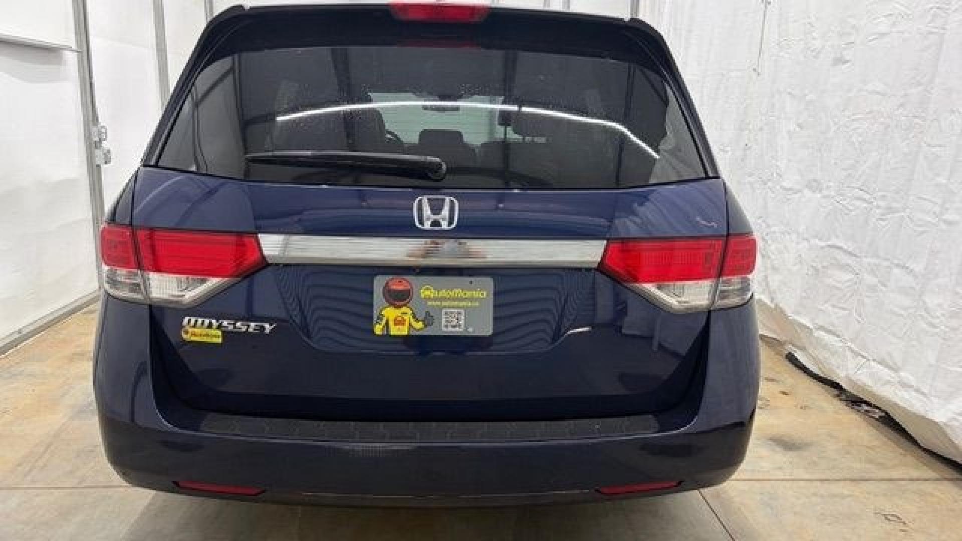 2016 Blue Honda Odyssey EX-L (5FNRL5H66GB) with an 3.5L V-6 i-VTEC variable valve control engine, located at 1806 Veterans Memorial Hwy SW, Austell, GA, 30168, (770) 944-9558, 33.817959, -84.606987- Photo#4