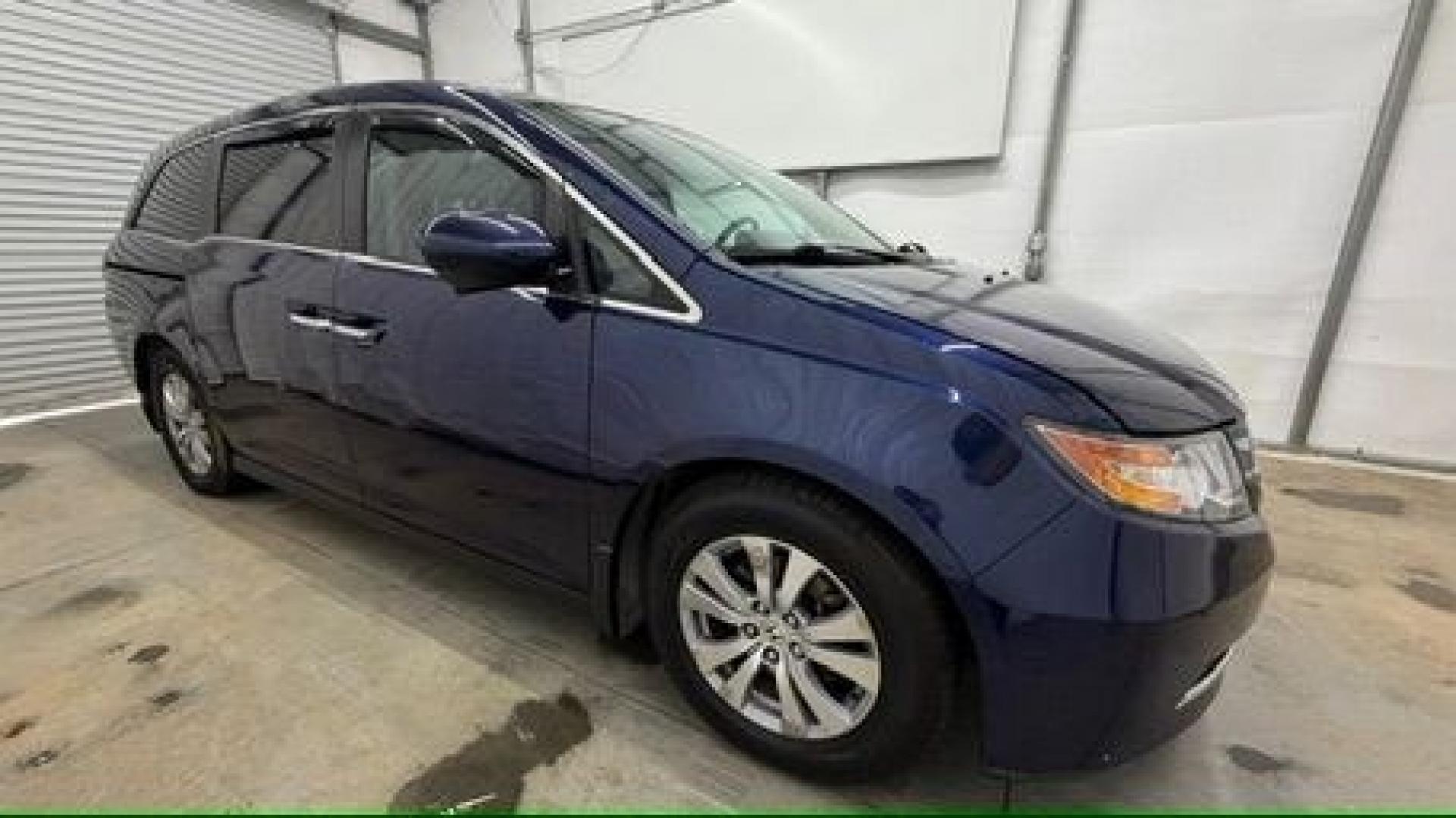 2016 Blue Honda Odyssey EX-L (5FNRL5H66GB) with an 3.5L V-6 i-VTEC variable valve control engine, located at 1806 Veterans Memorial Hwy SW, Austell, GA, 30168, (770) 944-9558, 33.817959, -84.606987- Photo#7