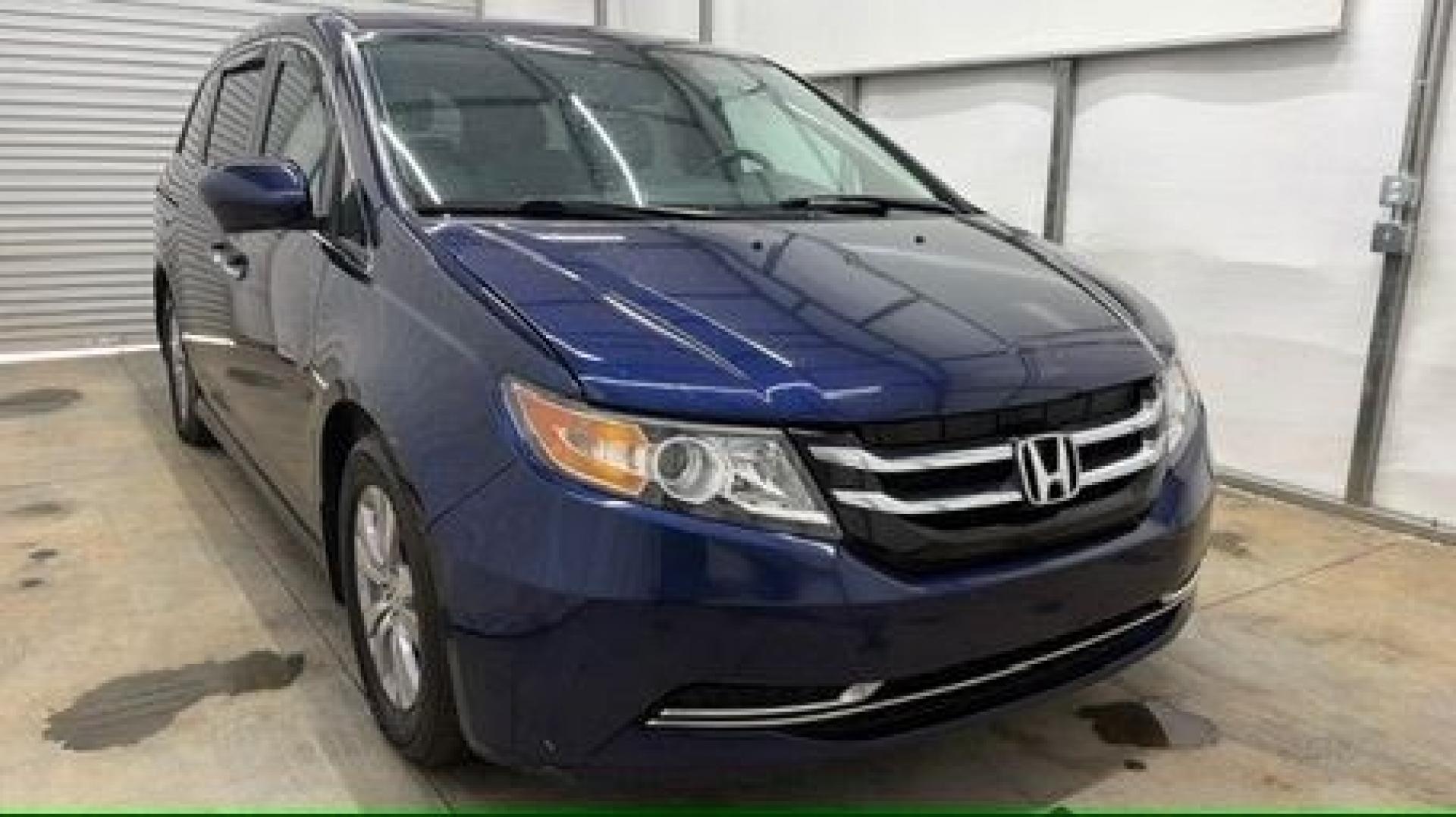 2016 Blue Honda Odyssey EX-L (5FNRL5H66GB) with an 3.5L V-6 i-VTEC variable valve control engine, located at 1806 Veterans Memorial Hwy SW, Austell, GA, 30168, (770) 944-9558, 33.817959, -84.606987- Photo#8