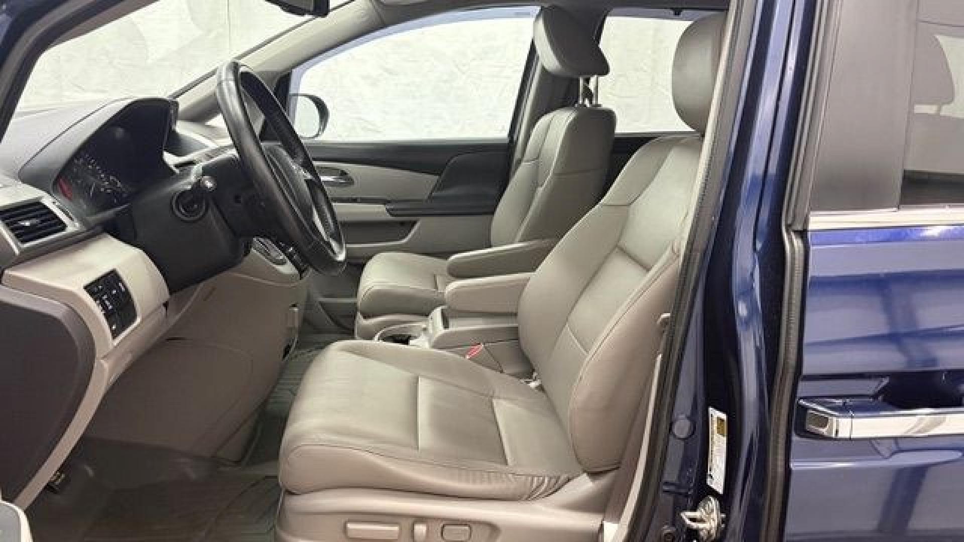 2016 Blue Honda Odyssey EX-L (5FNRL5H66GB) with an 3.5L V-6 i-VTEC variable valve control engine, located at 1806 Veterans Memorial Hwy SW, Austell, GA, 30168, (770) 944-9558, 33.817959, -84.606987- Photo#11