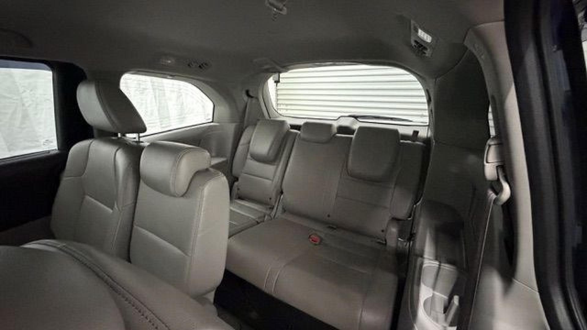 2016 Blue Honda Odyssey EX-L (5FNRL5H66GB) with an 3.5L V-6 i-VTEC variable valve control engine, located at 1806 Veterans Memorial Hwy SW, Austell, GA, 30168, (770) 944-9558, 33.817959, -84.606987- Photo#14