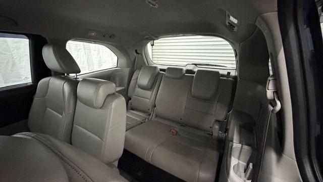 2016 Blue Honda Odyssey EX-L (5FNRL5H66GB) with an 3.5L V-6 i-VTEC variable valve control engine, located at 1806 Veterans Memorial Hwy SW, Austell, GA, 30168, (770) 944-9558, 33.817959, -84.606987 - Photo#14