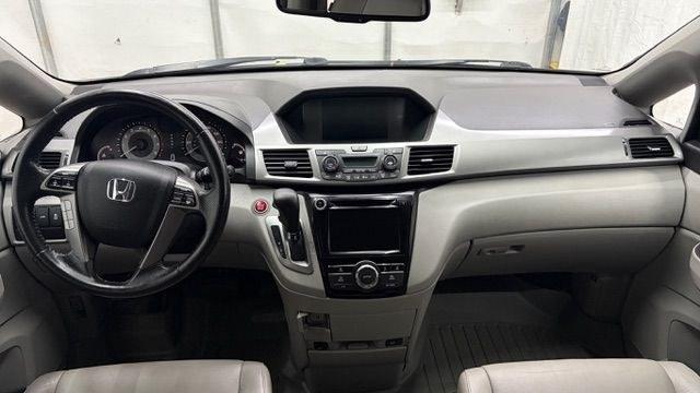 2016 Blue Honda Odyssey EX-L (5FNRL5H66GB) with an 3.5L V-6 i-VTEC variable valve control engine, located at 1806 Veterans Memorial Hwy SW, Austell, GA, 30168, (770) 944-9558, 33.817959, -84.606987 - Photo#15