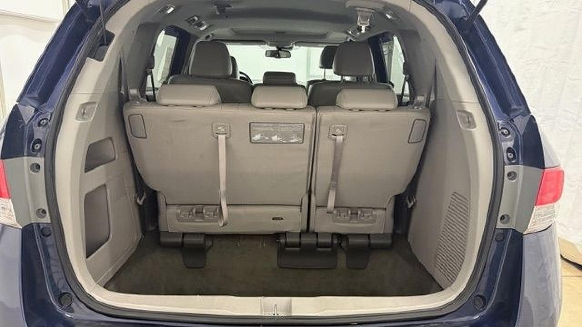 2016 Blue Honda Odyssey EX-L (5FNRL5H66GB) with an 3.5L V-6 i-VTEC variable valve control engine, located at 1806 Veterans Memorial Hwy SW, Austell, GA, 30168, (770) 944-9558, 33.817959, -84.606987- Photo#16