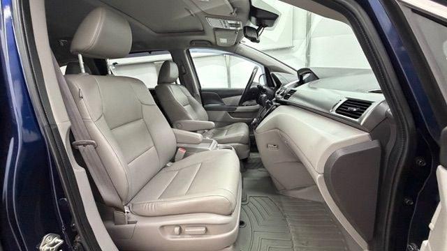 2016 Blue Honda Odyssey EX-L (5FNRL5H66GB) with an 3.5L V-6 i-VTEC variable valve control engine, located at 1806 Veterans Memorial Hwy SW, Austell, GA, 30168, (770) 944-9558, 33.817959, -84.606987 - Photo#18