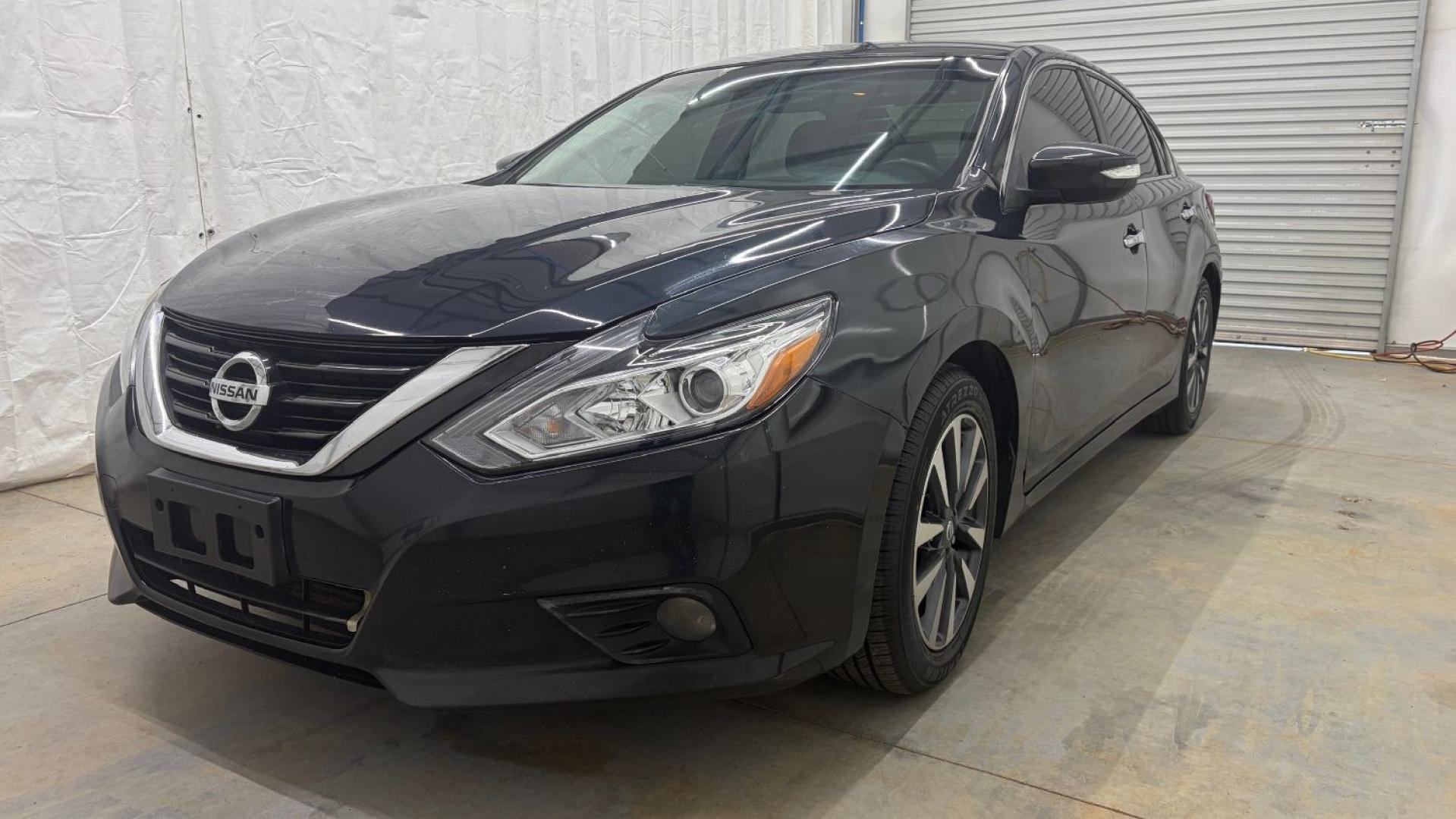 2017 BLACK Nissan Altima 2.5 SL (1N4AL3AP9HC) with an 2.5L I-4 DOHC engine, located at 1806 Veterans Memorial Hwy SW, Austell, GA, 30168, (770) 944-9558, 33.817959, -84.606987- Photo#0