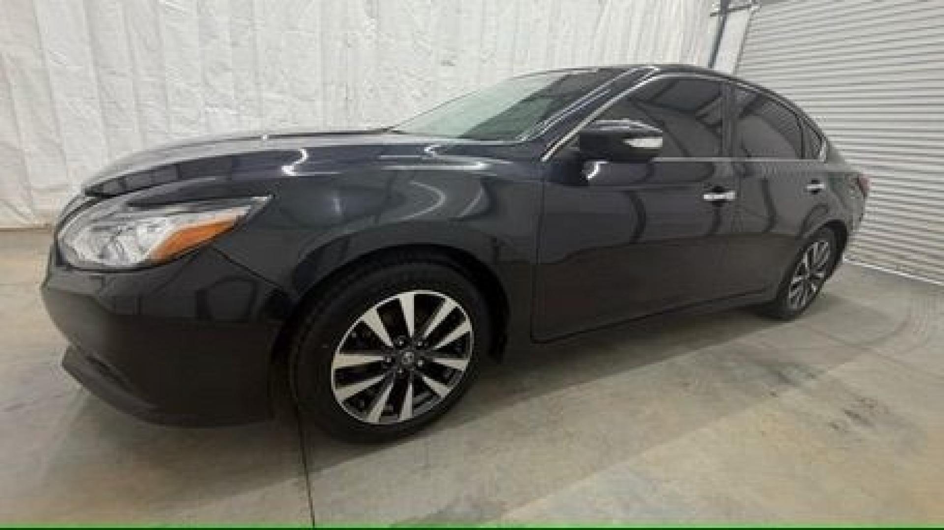 2017 BLACK Nissan Altima 2.5 SL (1N4AL3AP9HC) with an 2.5L I-4 DOHC engine, located at 1806 Veterans Memorial Hwy SW, Austell, GA, 30168, (770) 944-9558, 33.817959, -84.606987- Photo#1