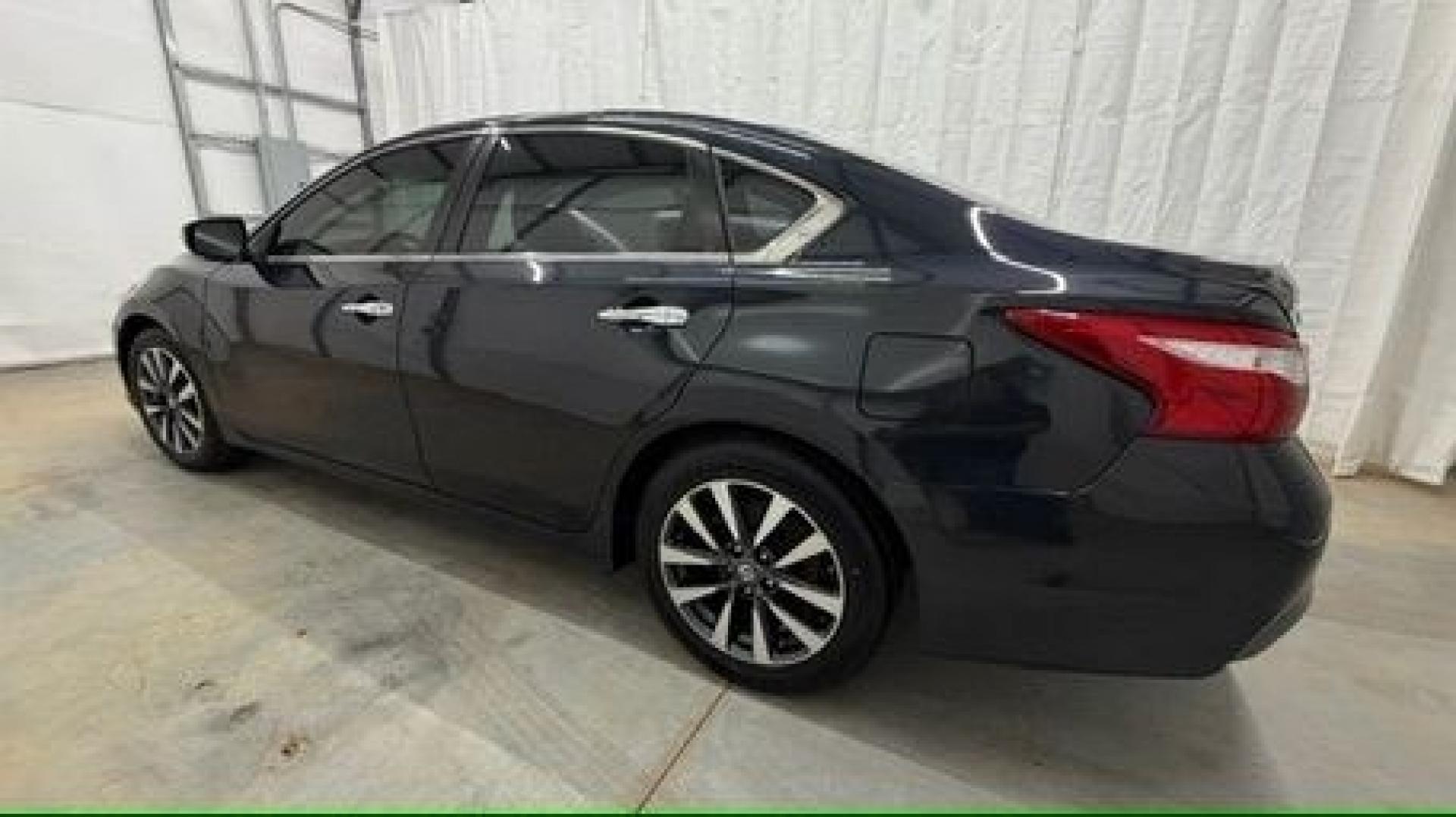 2017 BLACK Nissan Altima 2.5 SL (1N4AL3AP9HC) with an 2.5L I-4 DOHC engine, located at 1806 Veterans Memorial Hwy SW, Austell, GA, 30168, (770) 944-9558, 33.817959, -84.606987- Photo#2
