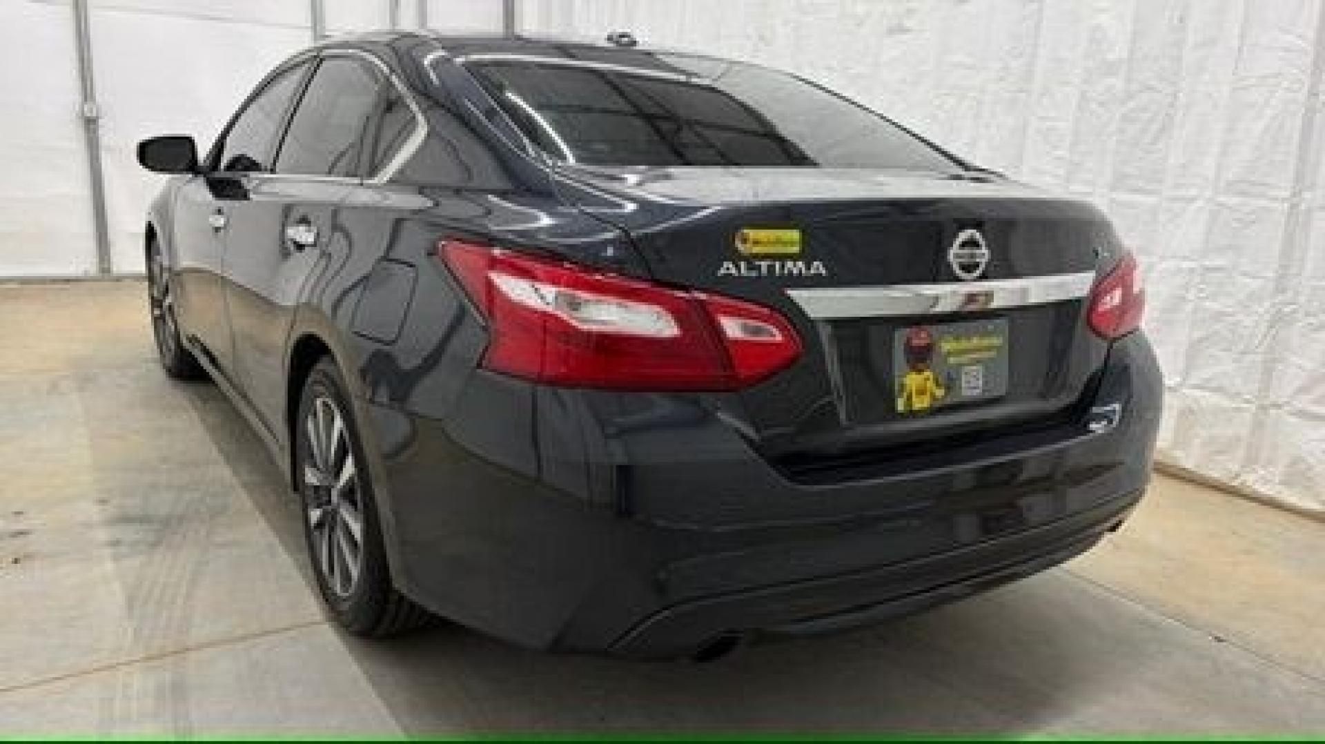 2017 BLACK Nissan Altima 2.5 SL (1N4AL3AP9HC) with an 2.5L I-4 DOHC engine, located at 1806 Veterans Memorial Hwy SW, Austell, GA, 30168, (770) 944-9558, 33.817959, -84.606987- Photo#3