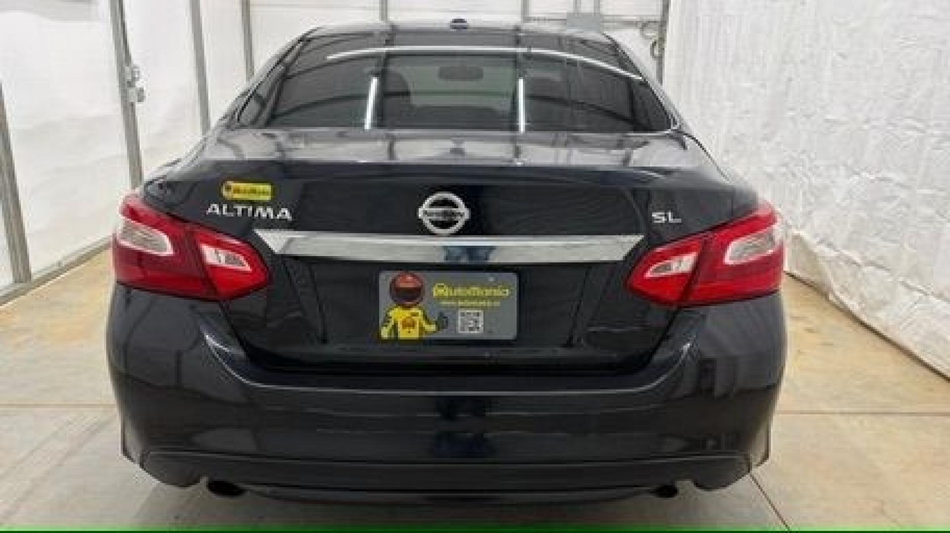 2017 BLACK Nissan Altima 2.5 SL (1N4AL3AP9HC) with an 2.5L I-4 DOHC engine, located at 1806 Veterans Memorial Hwy SW, Austell, GA, 30168, (770) 944-9558, 33.817959, -84.606987- Photo#4