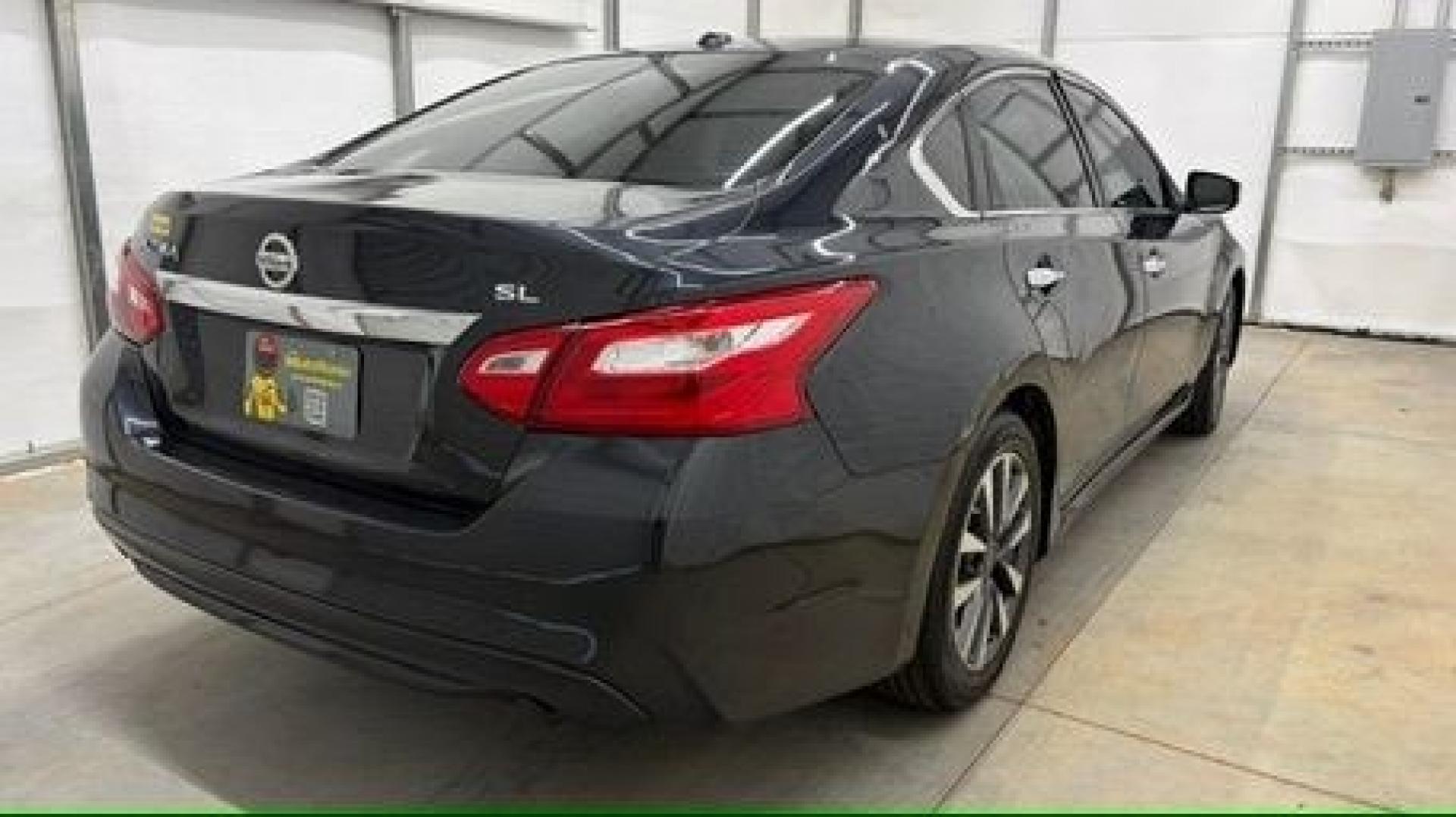 2017 BLACK Nissan Altima 2.5 SL (1N4AL3AP9HC) with an 2.5L I-4 DOHC engine, located at 1806 Veterans Memorial Hwy SW, Austell, GA, 30168, (770) 944-9558, 33.817959, -84.606987- Photo#5