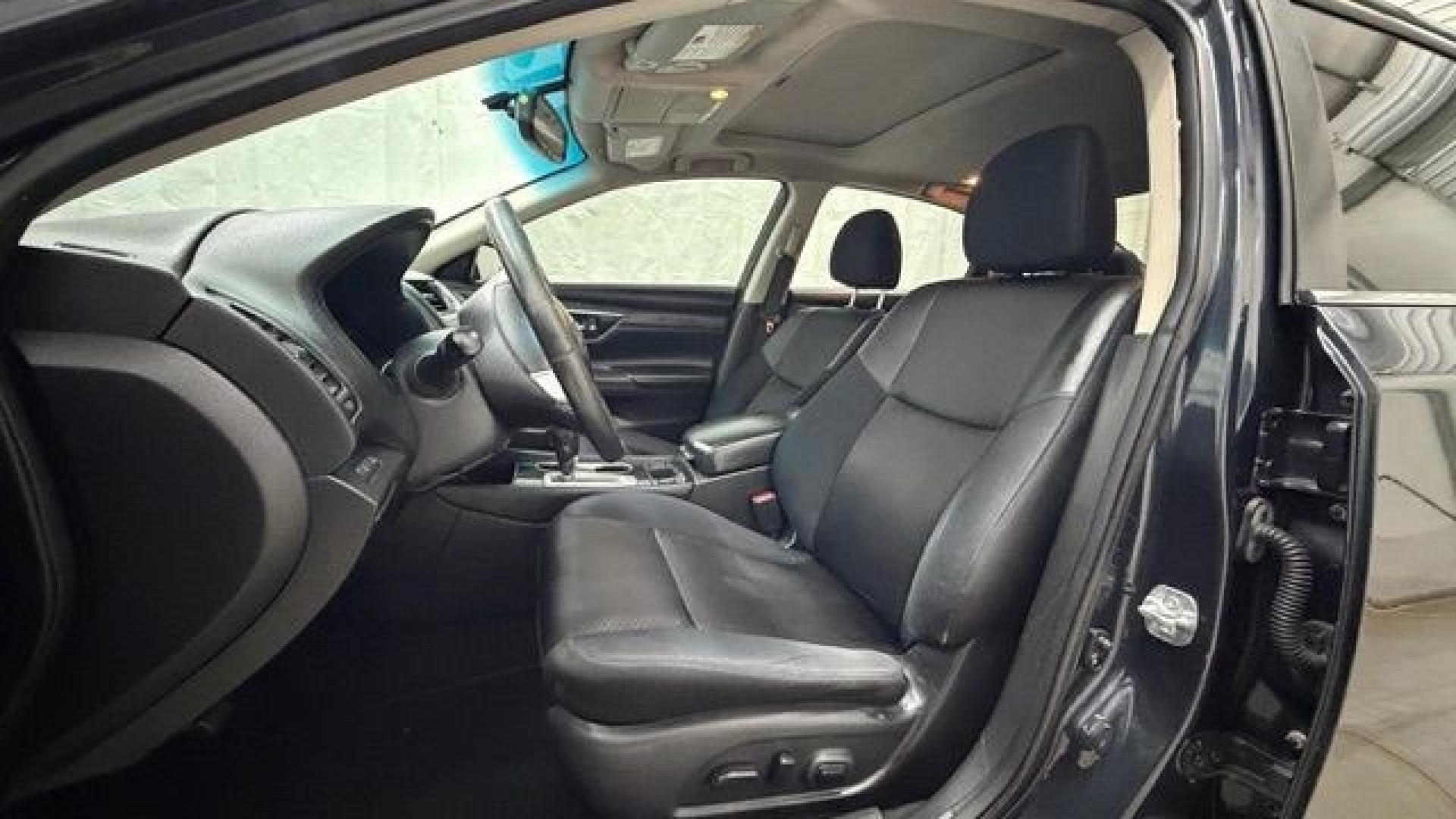 2017 BLACK Nissan Altima 2.5 SL (1N4AL3AP9HC) with an 2.5L I-4 DOHC engine, located at 1806 Veterans Memorial Hwy SW, Austell, GA, 30168, (770) 944-9558, 33.817959, -84.606987- Photo#12