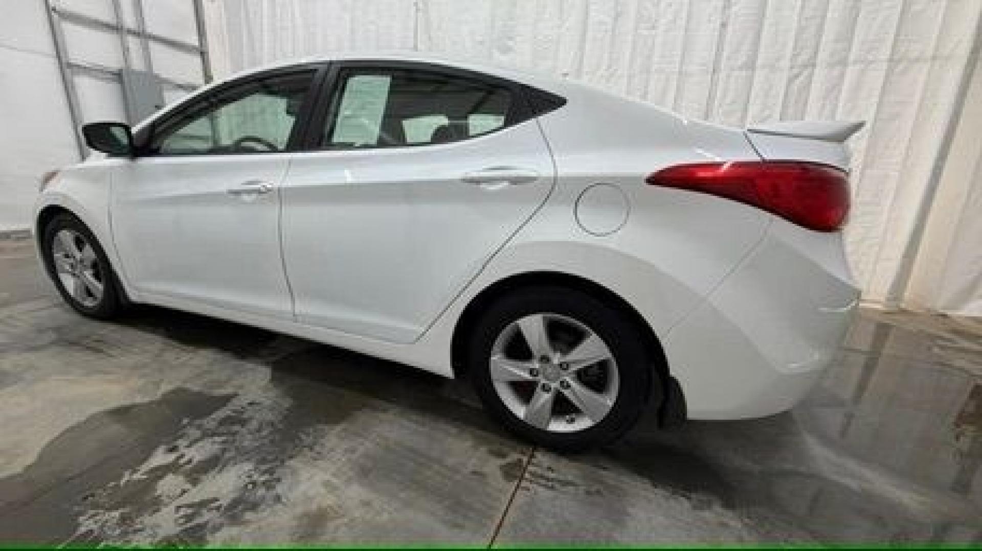 2013 White Hyundai Elantra GLS (5NPDH4AE6DH) with an 1.8L I-4 DOHC engine, located at 1806 Veterans Memorial Hwy SW, Austell, GA, 30168, (770) 944-9558, 33.817959, -84.606987- Photo#2