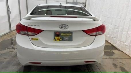 2013 White Hyundai Elantra GLS (5NPDH4AE6DH) with an 1.8L I-4 DOHC engine, located at 1806 Veterans Memorial Hwy SW, Austell, GA, 30168, (770) 944-9558, 33.817959, -84.606987 - Photo#4