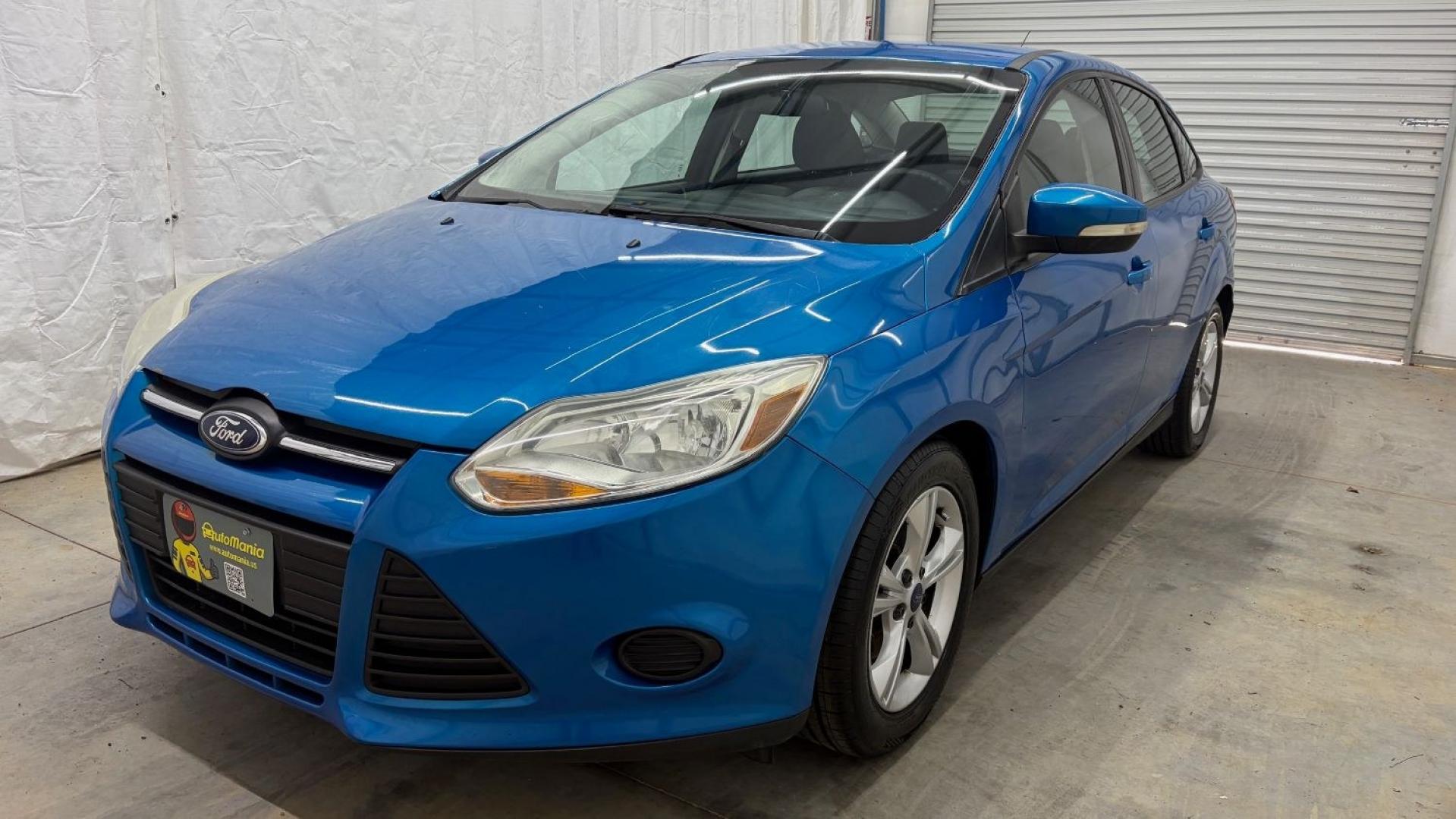 2014 Blue Ford Focus SE (1FADP3F2XEL) with an 2L I-4 gasoline direct injection engine, located at 1806 Veterans Memorial Hwy SW, Austell, GA, 30168, (770) 944-9558, 33.817959, -84.606987 - Why Choose Automania? At Automania, we make car buying easy and stress-free, with over 20 years serving Austell, GA and the surrounding communities. WE FINANCE GOOD AND NOT SO GOOD CREDIT, we work with all credit types, and every vehicle comes with a free vehicle history report so you know its backg- Photo#0