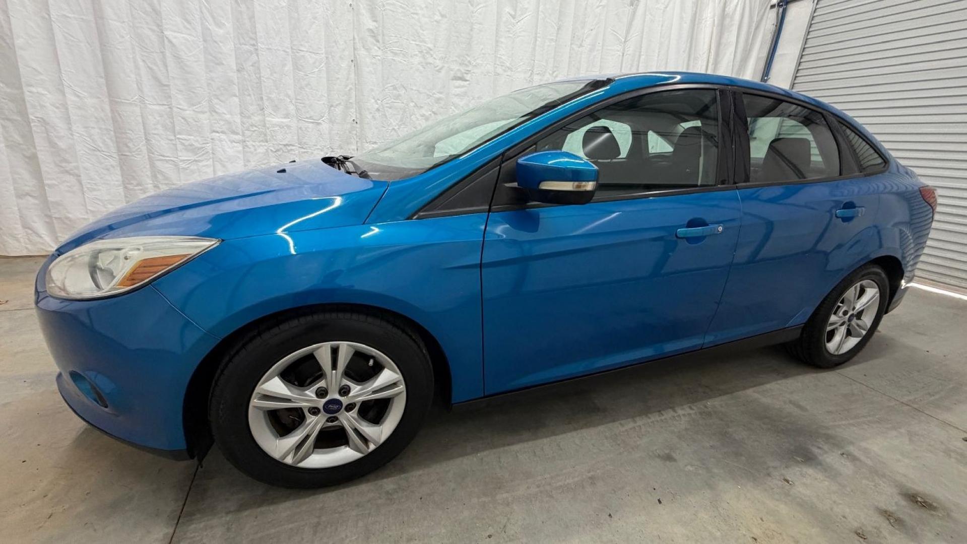 2014 Blue Ford Focus SE (1FADP3F2XEL) with an 2L I-4 gasoline direct injection engine, located at 1806 Veterans Memorial Hwy SW, Austell, GA, 30168, (770) 944-9558, 33.817959, -84.606987 - Why Choose Automania? At Automania, we make car buying easy and stress-free, with over 20 years serving Austell, GA and the surrounding communities. WE FINANCE GOOD AND NOT SO GOOD CREDIT, we work with all credit types, and every vehicle comes with a free vehicle history report so you know its backg- Photo#1