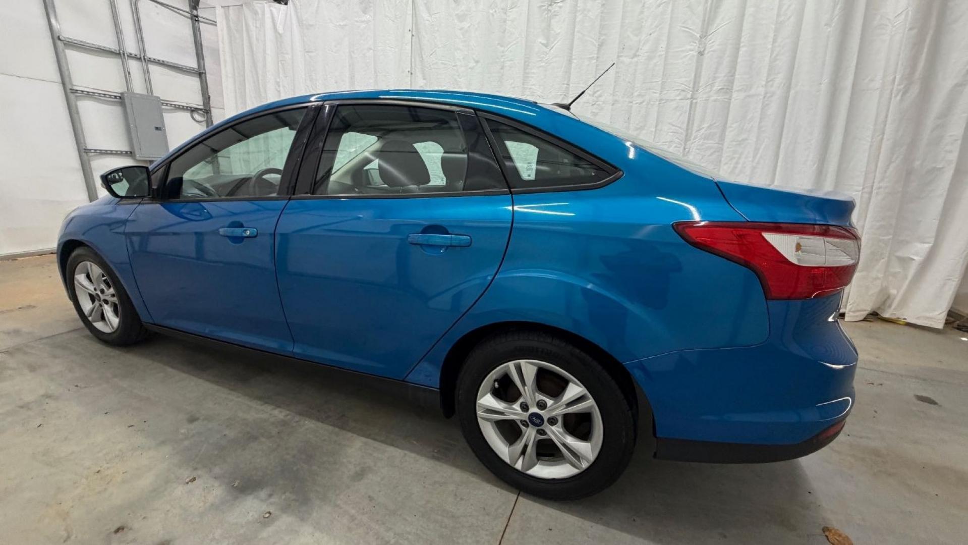 2014 Blue Ford Focus SE (1FADP3F2XEL) with an 2L I-4 gasoline direct injection engine, located at 1806 Veterans Memorial Hwy SW, Austell, GA, 30168, (770) 944-9558, 33.817959, -84.606987 - Why Choose Automania? At Automania, we make car buying easy and stress-free, with over 20 years serving Austell, GA and the surrounding communities. WE FINANCE GOOD AND NOT SO GOOD CREDIT, we work with all credit types, and every vehicle comes with a free vehicle history report so you know its backg- Photo#2