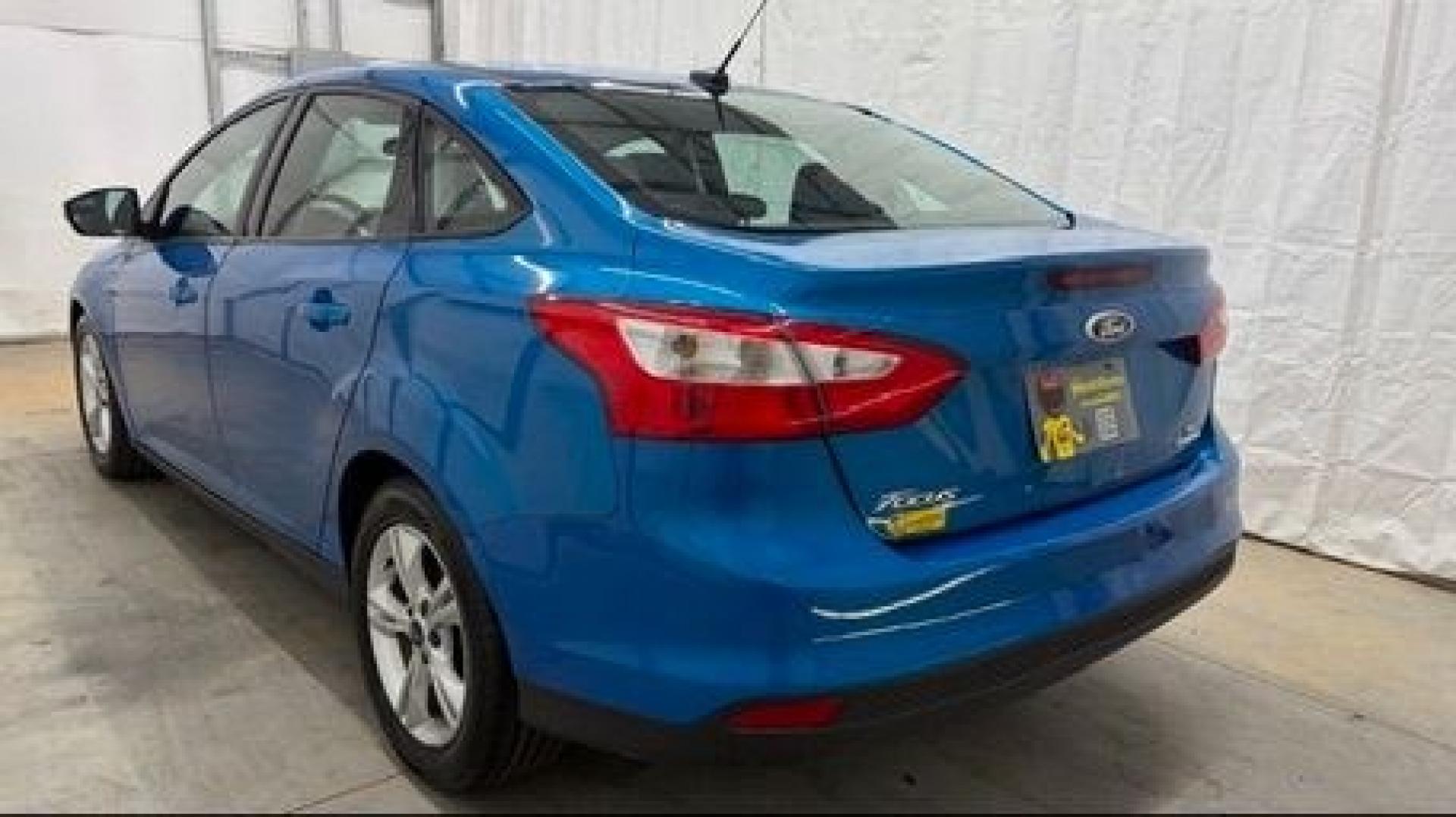 2014 Blue Ford Focus SE (1FADP3F2XEL) with an 2L I-4 gasoline direct injection engine, located at 1806 Veterans Memorial Hwy SW, Austell, GA, 30168, (770) 944-9558, 33.817959, -84.606987 - Why Choose Automania? At Automania, we make car buying easy and stress-free, with over 20 years serving Austell, GA and the surrounding communities. WE FINANCE GOOD AND NOT SO GOOD CREDIT, we work with all credit types, and every vehicle comes with a free vehicle history report so you know its backg- Photo#3