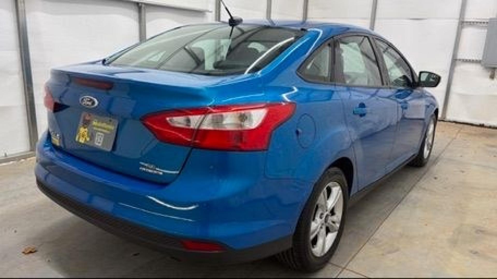 2014 Blue Ford Focus SE (1FADP3F2XEL) with an 2L I-4 gasoline direct injection engine, located at 1806 Veterans Memorial Hwy SW, Austell, GA, 30168, (770) 944-9558, 33.817959, -84.606987 - Why Choose Automania? At Automania, we make car buying easy and stress-free, with over 20 years serving Austell, GA and the surrounding communities. WE FINANCE GOOD AND NOT SO GOOD CREDIT, we work with all credit types, and every vehicle comes with a free vehicle history report so you know its backg- Photo#5