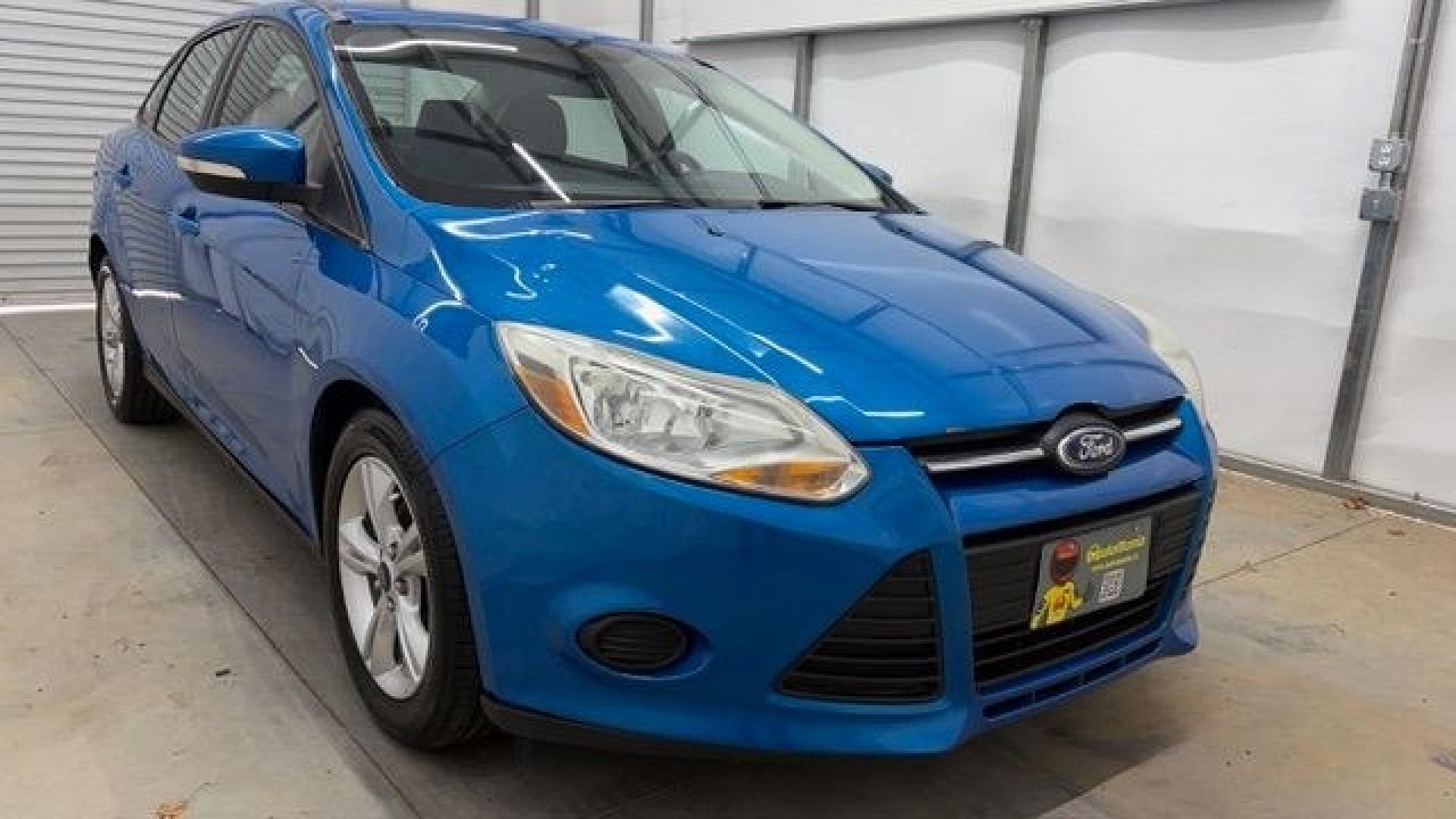 2014 Blue Ford Focus SE (1FADP3F2XEL) with an 2L I-4 gasoline direct injection engine, located at 1806 Veterans Memorial Hwy SW, Austell, GA, 30168, (770) 944-9558, 33.817959, -84.606987 - Why Choose Automania? At Automania, we make car buying easy and stress-free, with over 20 years serving Austell, GA and the surrounding communities. WE FINANCE GOOD AND NOT SO GOOD CREDIT, we work with all credit types, and every vehicle comes with a free vehicle history report so you know its backg- Photo#8