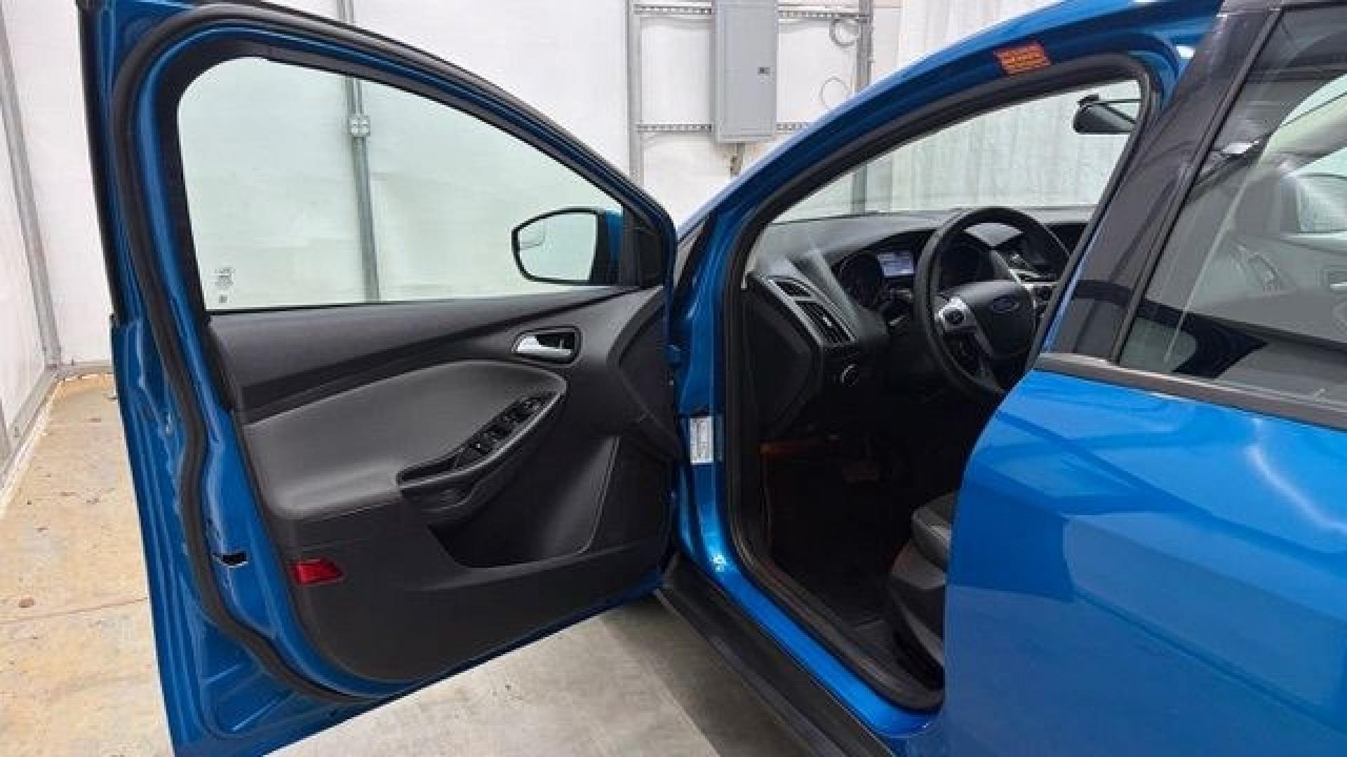 2014 Blue Ford Focus SE (1FADP3F2XEL) with an 2L I-4 gasoline direct injection engine, located at 1806 Veterans Memorial Hwy SW, Austell, GA, 30168, (770) 944-9558, 33.817959, -84.606987 - Why Choose Automania? At Automania, we make car buying easy and stress-free, with over 20 years serving Austell, GA and the surrounding communities. WE FINANCE GOOD AND NOT SO GOOD CREDIT, we work with all credit types, and every vehicle comes with a free vehicle history report so you know its backg- Photo#10