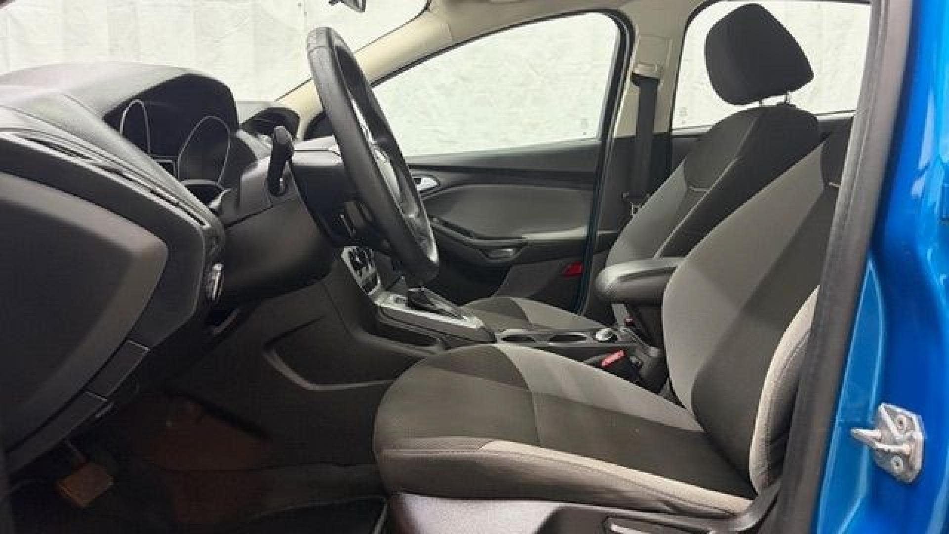 2014 Blue Ford Focus SE (1FADP3F2XEL) with an 2L I-4 gasoline direct injection engine, located at 1806 Veterans Memorial Hwy SW, Austell, GA, 30168, (770) 944-9558, 33.817959, -84.606987 - Why Choose Automania? At Automania, we make car buying easy and stress-free, with over 20 years serving Austell, GA and the surrounding communities. WE FINANCE GOOD AND NOT SO GOOD CREDIT, we work with all credit types, and every vehicle comes with a free vehicle history report so you know its backg- Photo#11