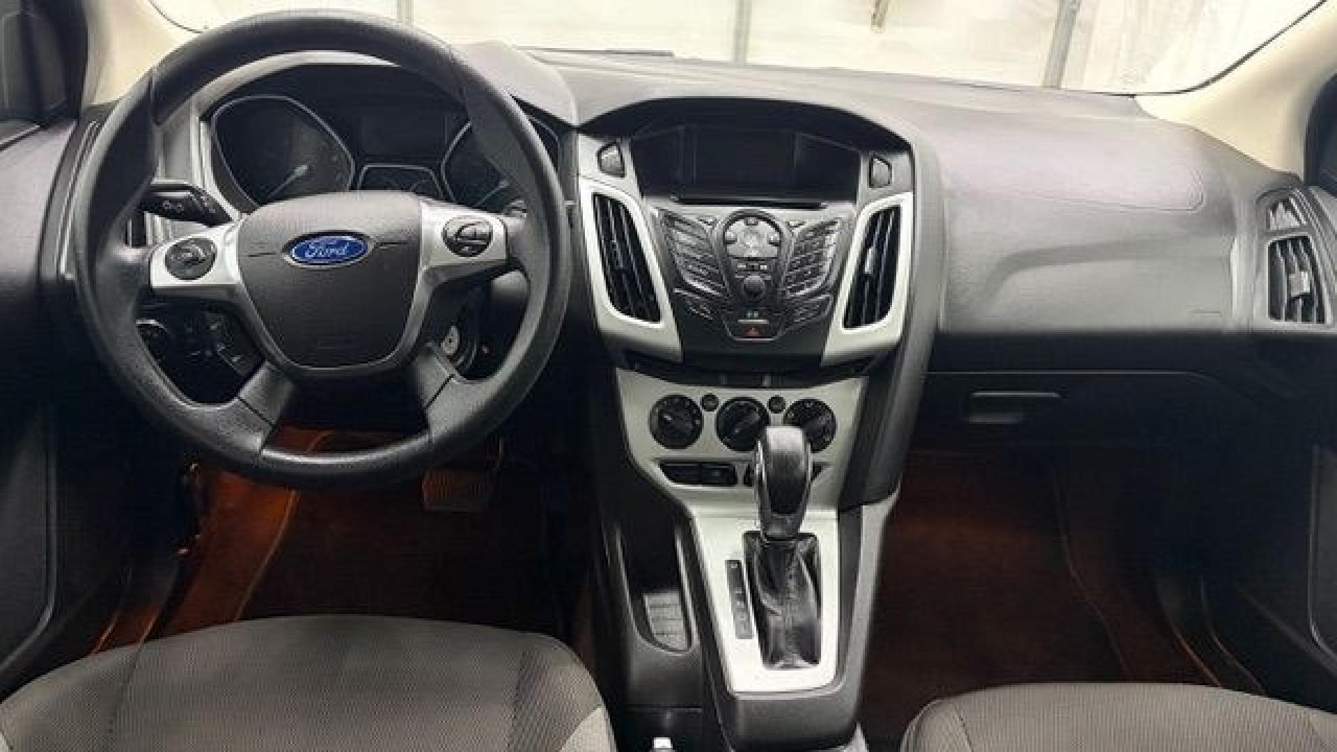 2014 Blue Ford Focus SE (1FADP3F2XEL) with an 2L I-4 gasoline direct injection engine, located at 1806 Veterans Memorial Hwy SW, Austell, GA, 30168, (770) 944-9558, 33.817959, -84.606987 - Why Choose Automania? At Automania, we make car buying easy and stress-free, with over 20 years serving Austell, GA and the surrounding communities. WE FINANCE GOOD AND NOT SO GOOD CREDIT, we work with all credit types, and every vehicle comes with a free vehicle history report so you know its backg- Photo#15