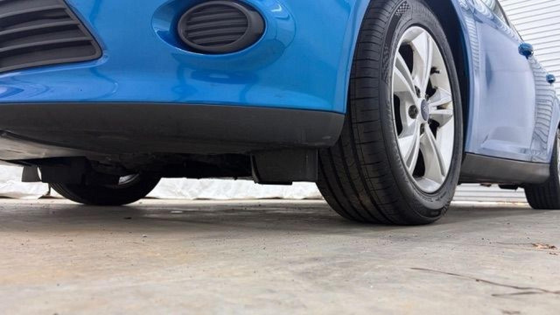 2014 Blue Ford Focus SE (1FADP3F2XEL) with an 2L I-4 gasoline direct injection engine, located at 1806 Veterans Memorial Hwy SW, Austell, GA, 30168, (770) 944-9558, 33.817959, -84.606987 - Why Choose Automania? At Automania, we make car buying easy and stress-free, with over 20 years serving Austell, GA and the surrounding communities. WE FINANCE GOOD AND NOT SO GOOD CREDIT, we work with all credit types, and every vehicle comes with a free vehicle history report so you know its backg- Photo#19