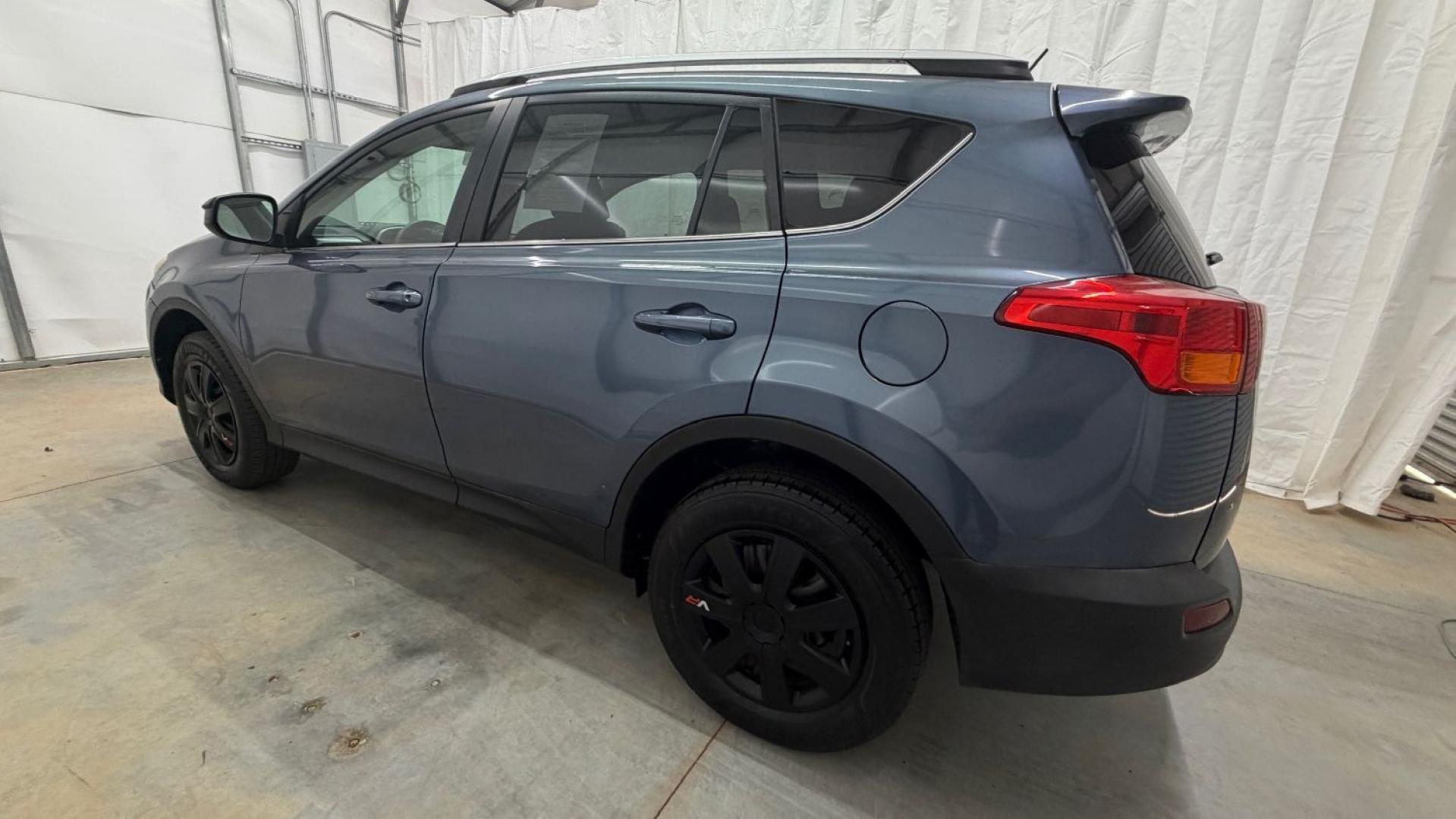 2014 Blue Toyota RAV4 LE (2T3ZFREV3EW) with an 2.5L I-4 DOHC engine, located at 1806 Veterans Memorial Hwy SW, Austell, GA, 30168, (770) 944-9558, 33.817959, -84.606987 - Why Choose Automania? At Automania, we make car buying easy and stress-free, with over 20 years serving Austell, GA and the surrounding communities. WE FINANCE GOOD AND NOT SO GOOD CREDIT, we work with all credit types, and every vehicle comes with a free vehicle history report so you know its backg- Photo#2
