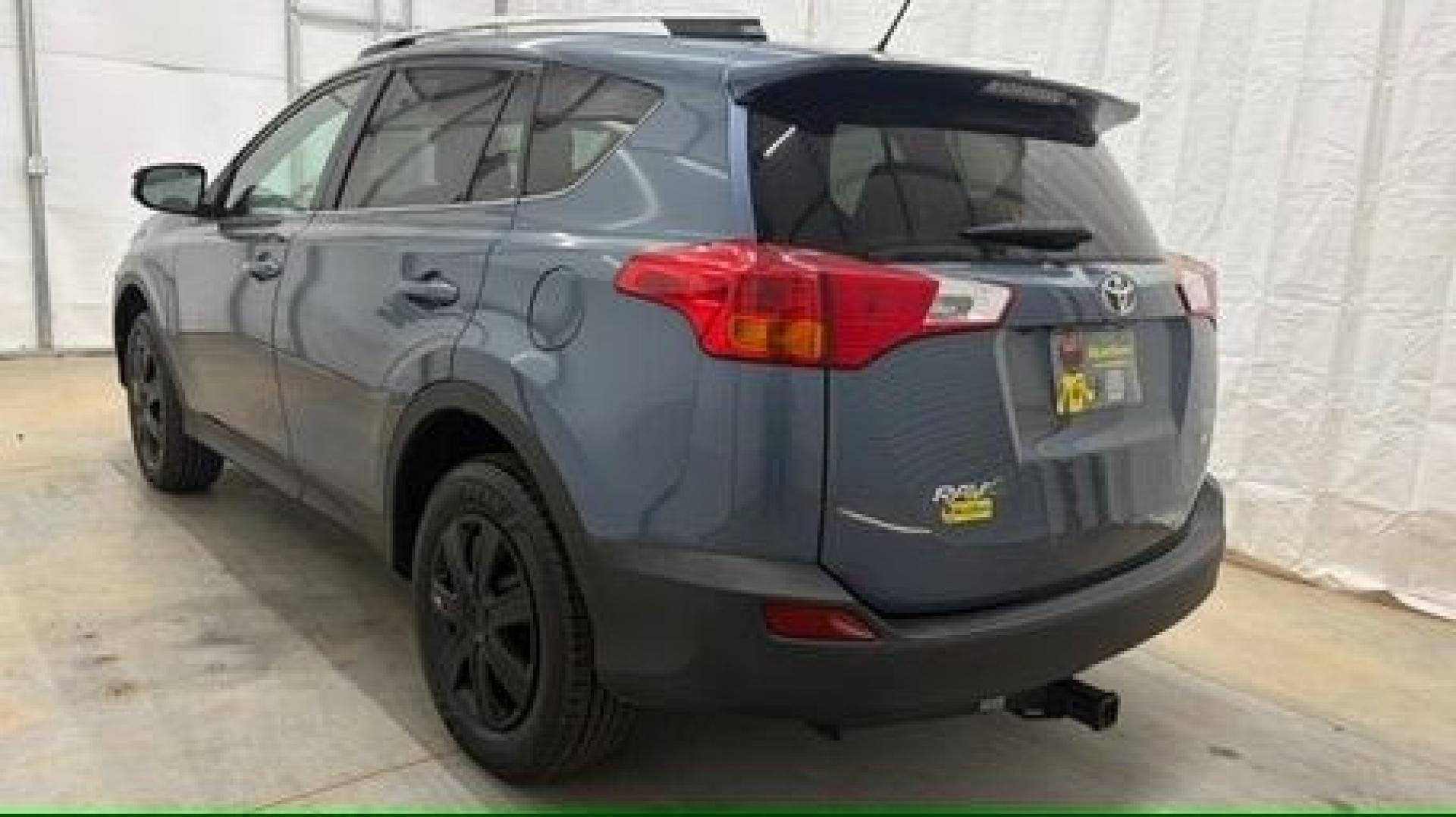 2014 Blue Toyota RAV4 LE (2T3ZFREV3EW) with an 2.5L I-4 DOHC engine, located at 1806 Veterans Memorial Hwy SW, Austell, GA, 30168, (770) 944-9558, 33.817959, -84.606987 - Why Choose Automania? At Automania, we make car buying easy and stress-free, with over 20 years serving Austell, GA and the surrounding communities. WE FINANCE GOOD AND NOT SO GOOD CREDIT, we work with all credit types, and every vehicle comes with a free vehicle history report so you know its backg- Photo#3