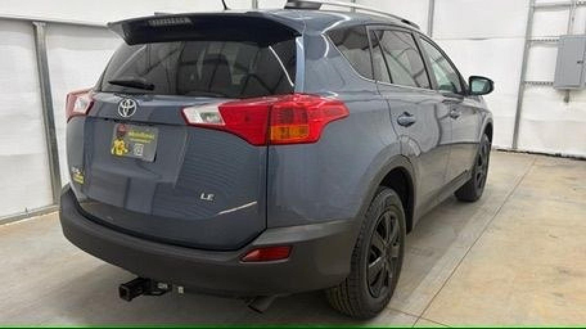 2014 Blue Toyota RAV4 LE (2T3ZFREV3EW) with an 2.5L I-4 DOHC engine, located at 1806 Veterans Memorial Hwy SW, Austell, GA, 30168, (770) 944-9558, 33.817959, -84.606987 - Why Choose Automania? At Automania, we make car buying easy and stress-free, with over 20 years serving Austell, GA and the surrounding communities. WE FINANCE GOOD AND NOT SO GOOD CREDIT, we work with all credit types, and every vehicle comes with a free vehicle history report so you know its backg- Photo#5