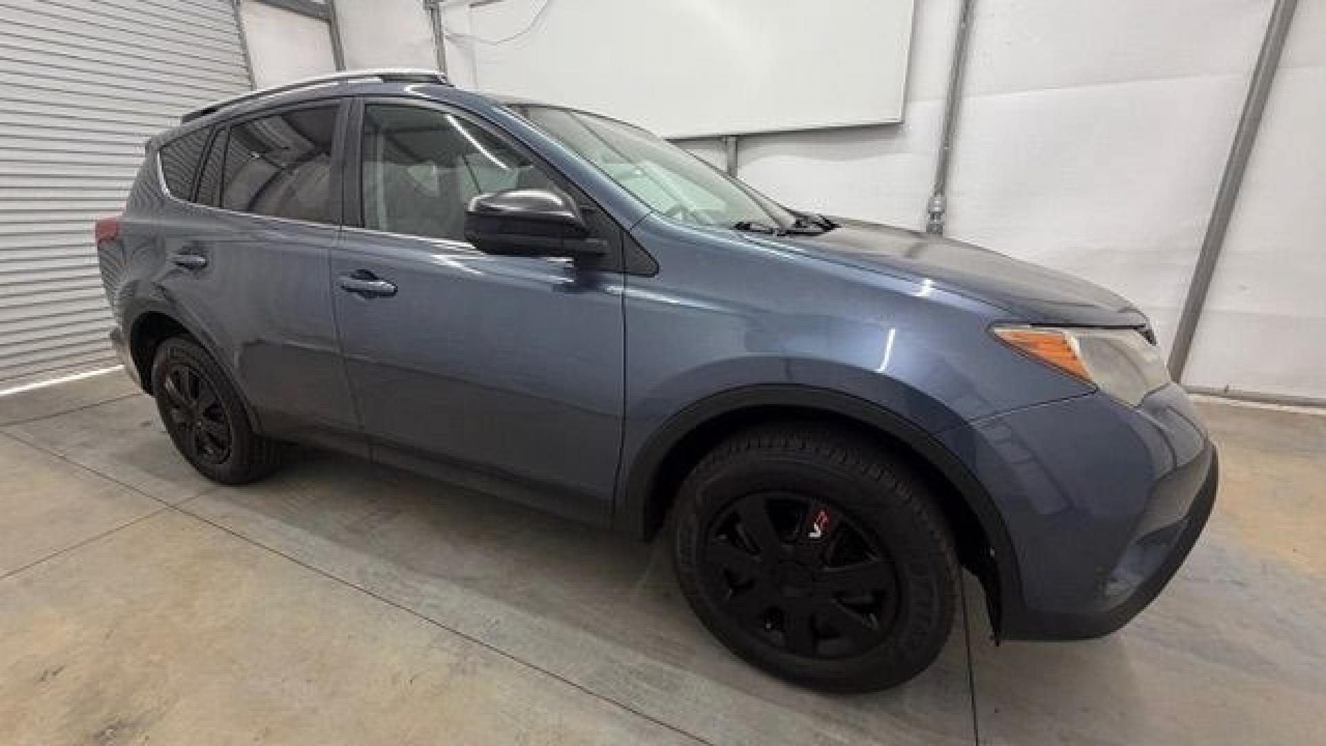2014 Blue Toyota RAV4 LE (2T3ZFREV3EW) with an 2.5L I-4 DOHC engine, located at 1806 Veterans Memorial Hwy SW, Austell, GA, 30168, (770) 944-9558, 33.817959, -84.606987 - Why Choose Automania? At Automania, we make car buying easy and stress-free, with over 20 years serving Austell, GA and the surrounding communities. WE FINANCE GOOD AND NOT SO GOOD CREDIT, we work with all credit types, and every vehicle comes with a free vehicle history report so you know its backg- Photo#7