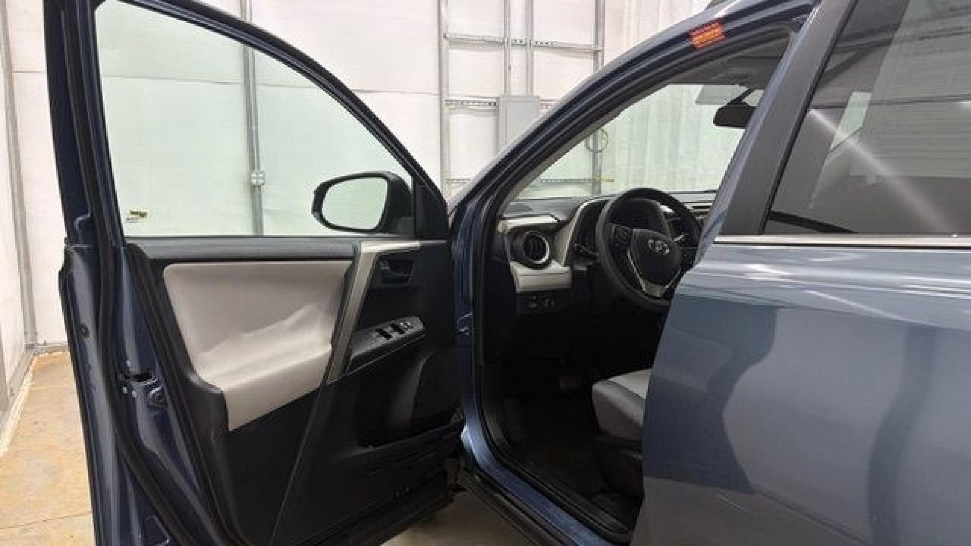 2014 Blue Toyota RAV4 LE (2T3ZFREV3EW) with an 2.5L I-4 DOHC engine, located at 1806 Veterans Memorial Hwy SW, Austell, GA, 30168, (770) 944-9558, 33.817959, -84.606987 - Why Choose Automania? At Automania, we make car buying easy and stress-free, with over 20 years serving Austell, GA and the surrounding communities. WE FINANCE GOOD AND NOT SO GOOD CREDIT, we work with all credit types, and every vehicle comes with a free vehicle history report so you know its backg- Photo#10