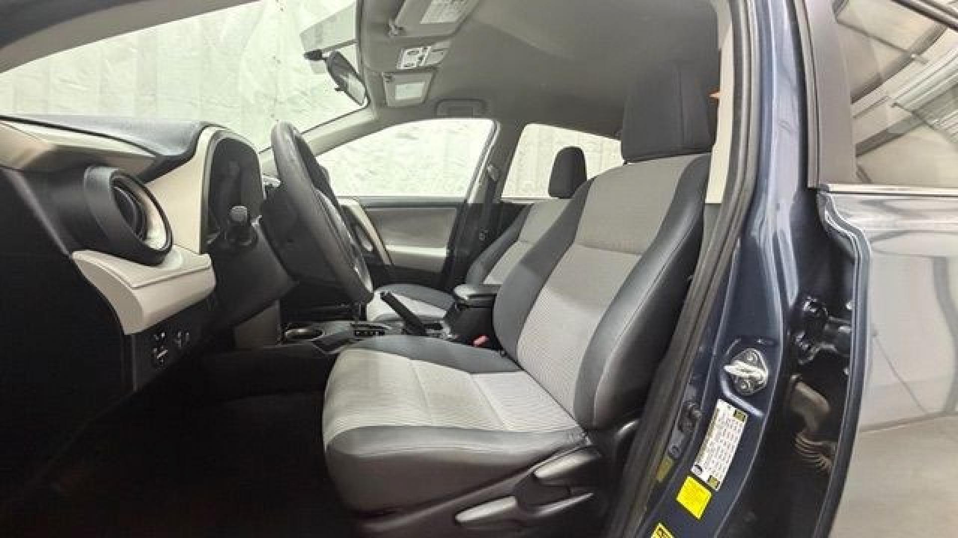 2014 Blue Toyota RAV4 LE (2T3ZFREV3EW) with an 2.5L I-4 DOHC engine, located at 1806 Veterans Memorial Hwy SW, Austell, GA, 30168, (770) 944-9558, 33.817959, -84.606987 - Why Choose Automania? At Automania, we make car buying easy and stress-free, with over 20 years serving Austell, GA and the surrounding communities. WE FINANCE GOOD AND NOT SO GOOD CREDIT, we work with all credit types, and every vehicle comes with a free vehicle history report so you know its backg- Photo#12