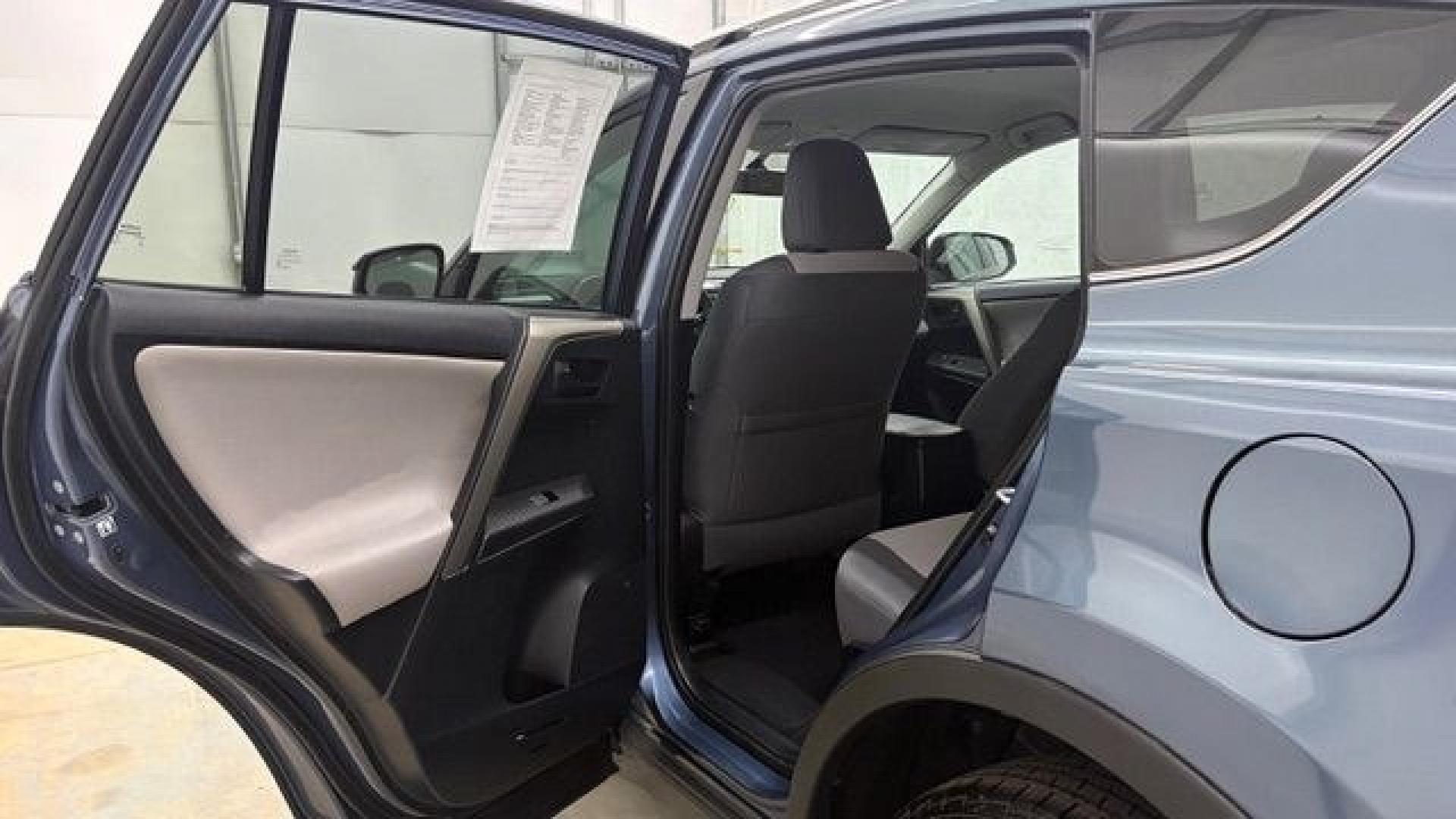 2014 Blue Toyota RAV4 LE (2T3ZFREV3EW) with an 2.5L I-4 DOHC engine, located at 1806 Veterans Memorial Hwy SW, Austell, GA, 30168, (770) 944-9558, 33.817959, -84.606987 - Why Choose Automania? At Automania, we make car buying easy and stress-free, with over 20 years serving Austell, GA and the surrounding communities. WE FINANCE GOOD AND NOT SO GOOD CREDIT, we work with all credit types, and every vehicle comes with a free vehicle history report so you know its backg- Photo#13