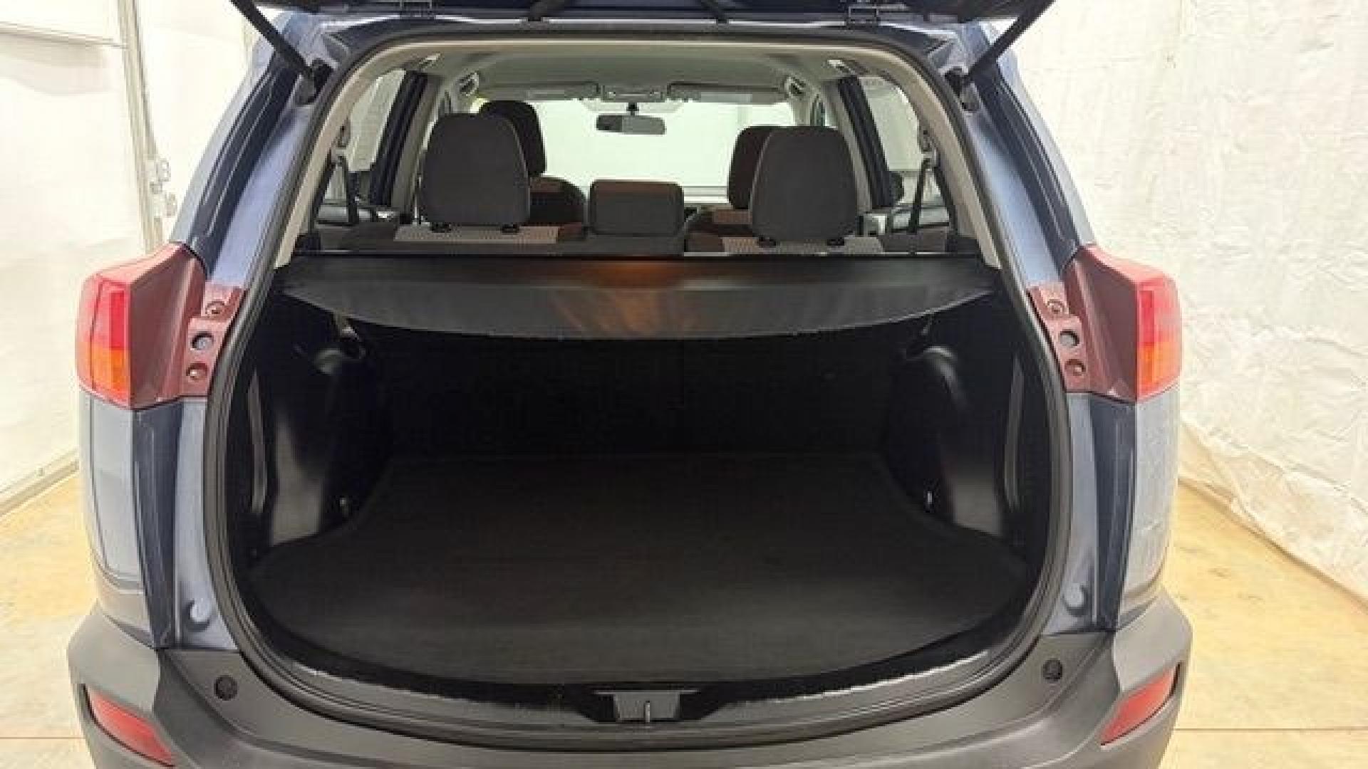 2014 Blue Toyota RAV4 LE (2T3ZFREV3EW) with an 2.5L I-4 DOHC engine, located at 1806 Veterans Memorial Hwy SW, Austell, GA, 30168, (770) 944-9558, 33.817959, -84.606987 - Why Choose Automania? At Automania, we make car buying easy and stress-free, with over 20 years serving Austell, GA and the surrounding communities. WE FINANCE GOOD AND NOT SO GOOD CREDIT, we work with all credit types, and every vehicle comes with a free vehicle history report so you know its backg- Photo#15