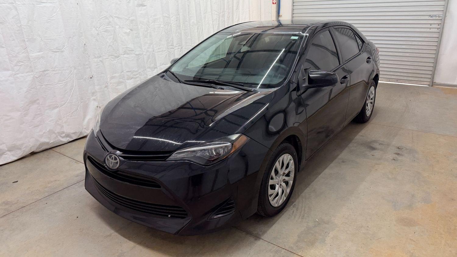 2019 Black Toyota Corolla LE (5YFBURHE2KP) with an 1.8L I-4 DOHC engine, located at 1806 Veterans Memorial Hwy SW, Austell, GA, 30168, (770) 944-9558, 33.817959, -84.606987- Photo#0
