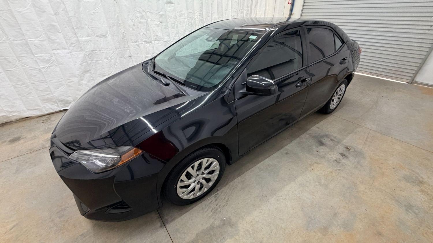 2019 Black Toyota Corolla LE (5YFBURHE2KP) with an 1.8L I-4 DOHC engine, located at 1806 Veterans Memorial Hwy SW, Austell, GA, 30168, (770) 944-9558, 33.817959, -84.606987- Photo#1