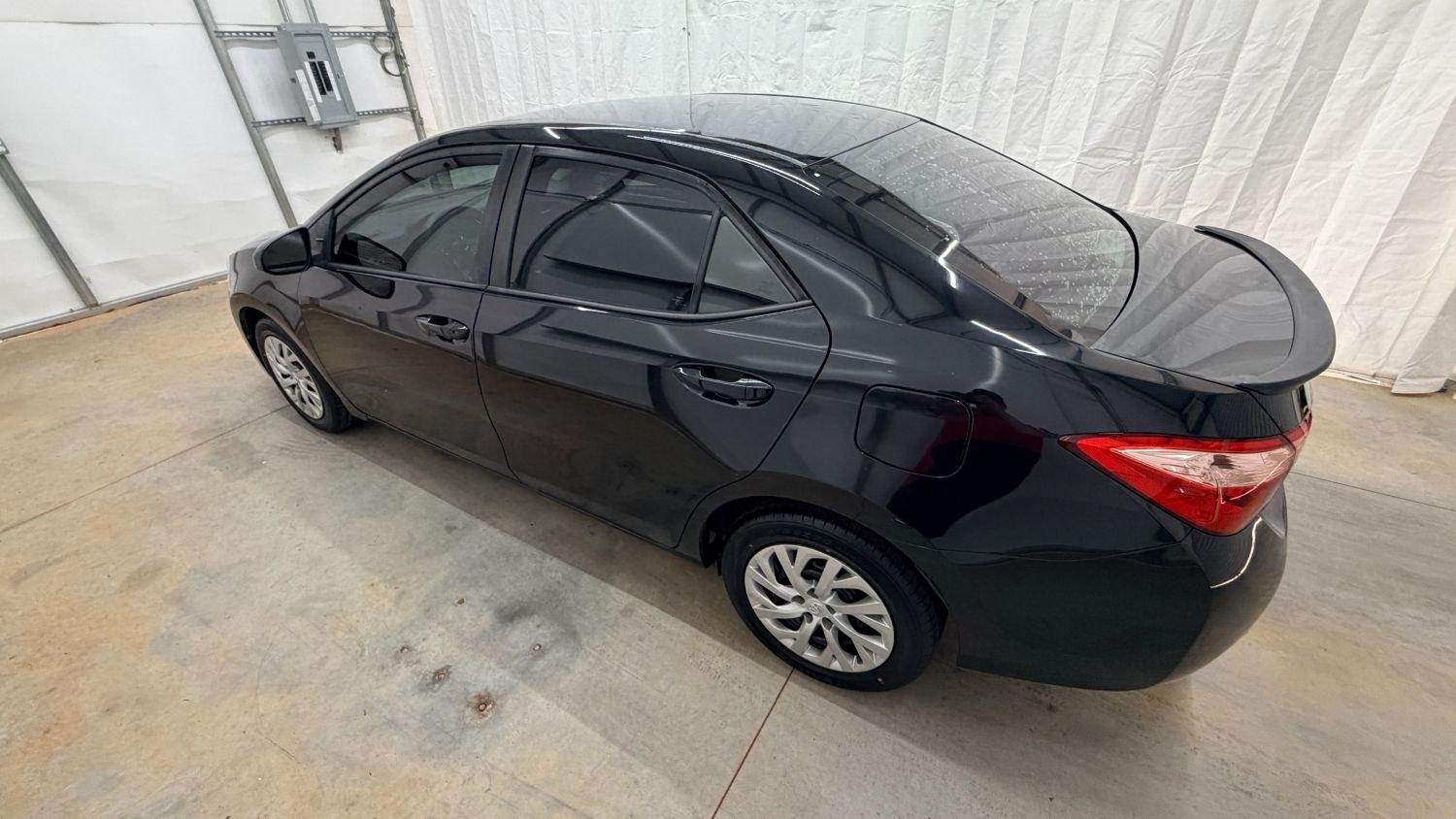 2019 Black Toyota Corolla LE (5YFBURHE2KP) with an 1.8L I-4 DOHC engine, located at 1806 Veterans Memorial Hwy SW, Austell, GA, 30168, (770) 944-9558, 33.817959, -84.606987- Photo#2