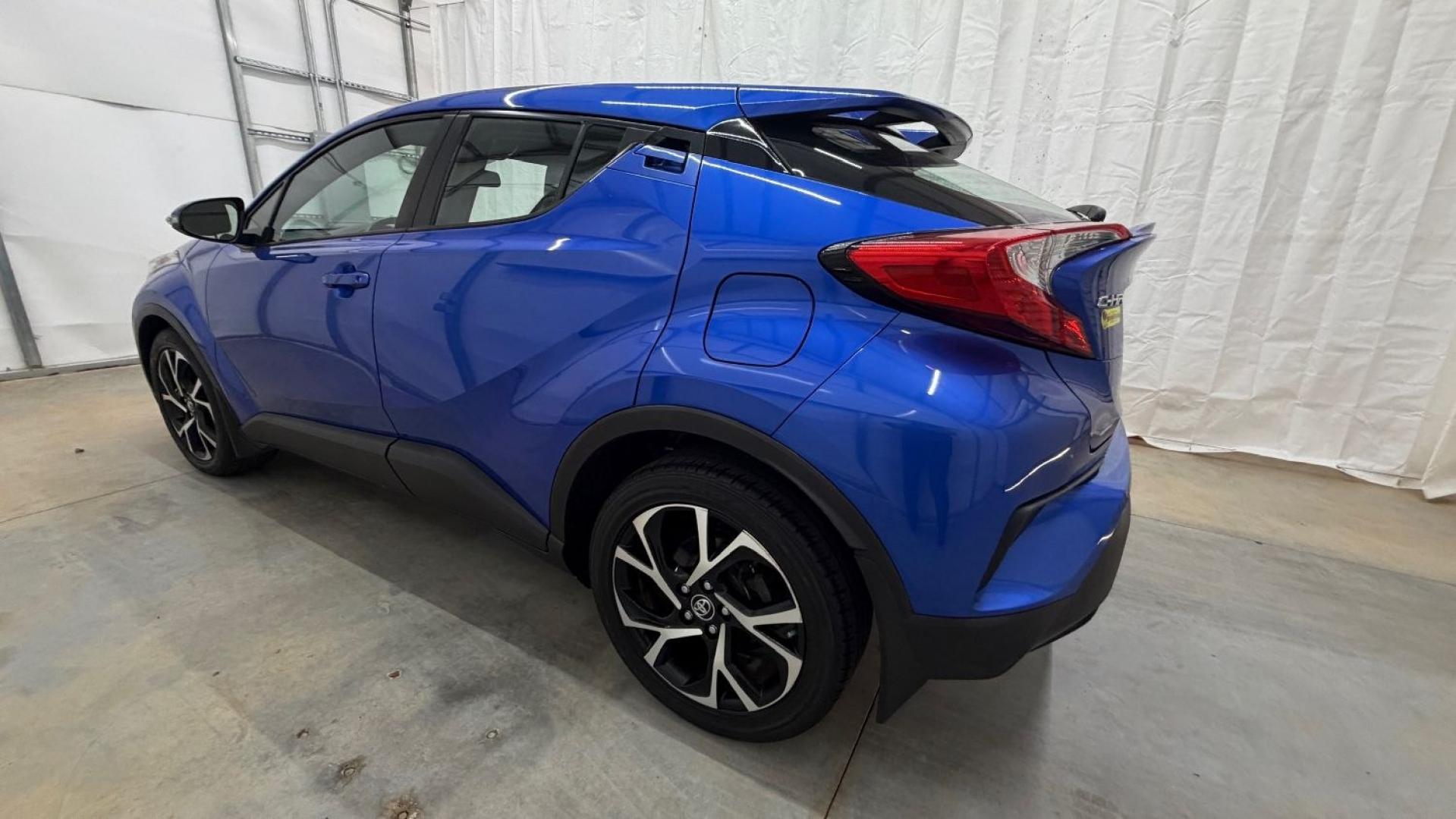 2018 Blue Toyota C-HR XLE Premium (NMTKHMBX7JR) with an 2L I-4 DOHC engine, located at 1806 Veterans Memorial Hwy SW, Austell, GA, 30168, (770) 944-9558, 33.817959, -84.606987- Photo#2